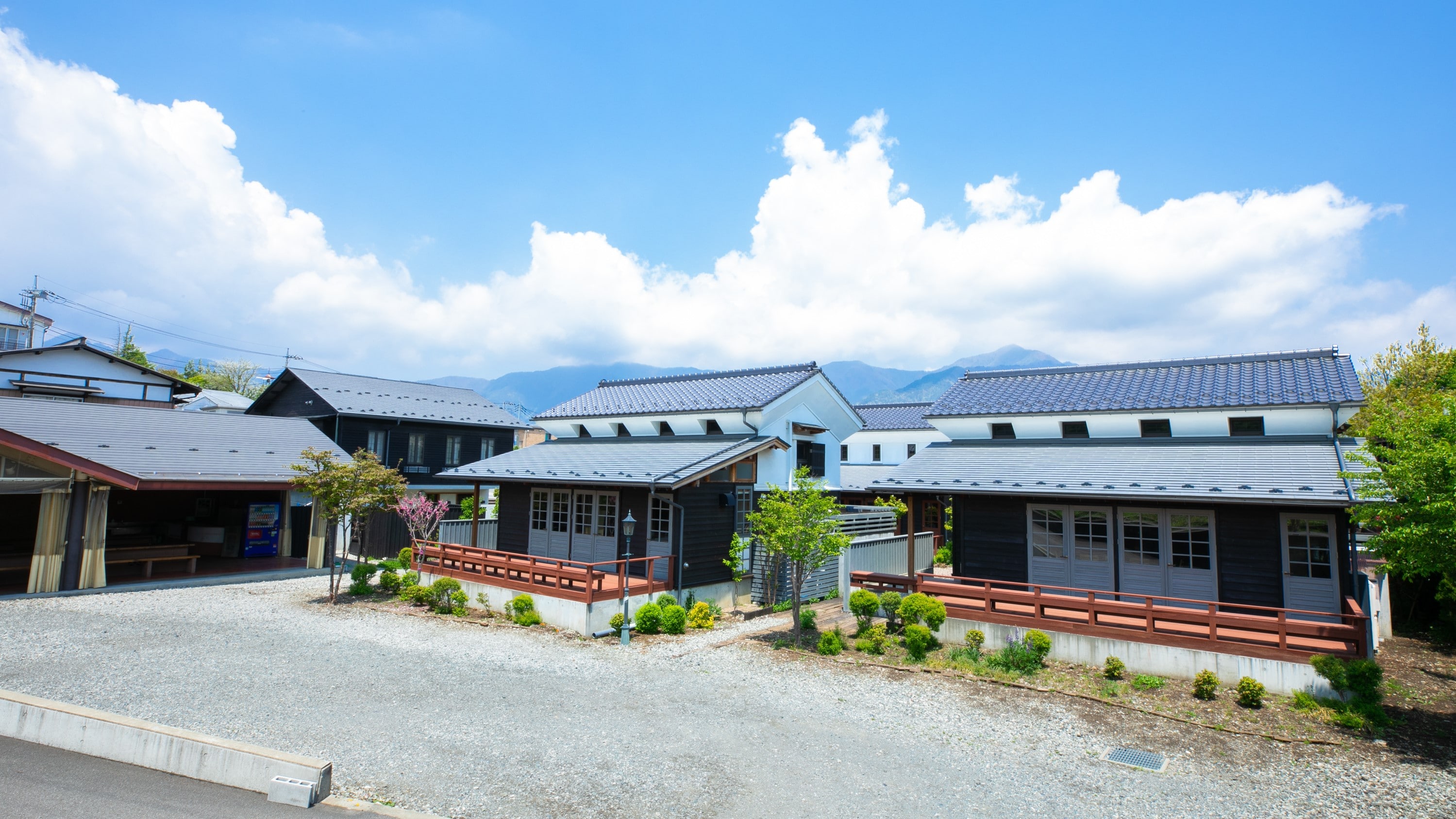 Second parking lot, accommodation building and BBQ building