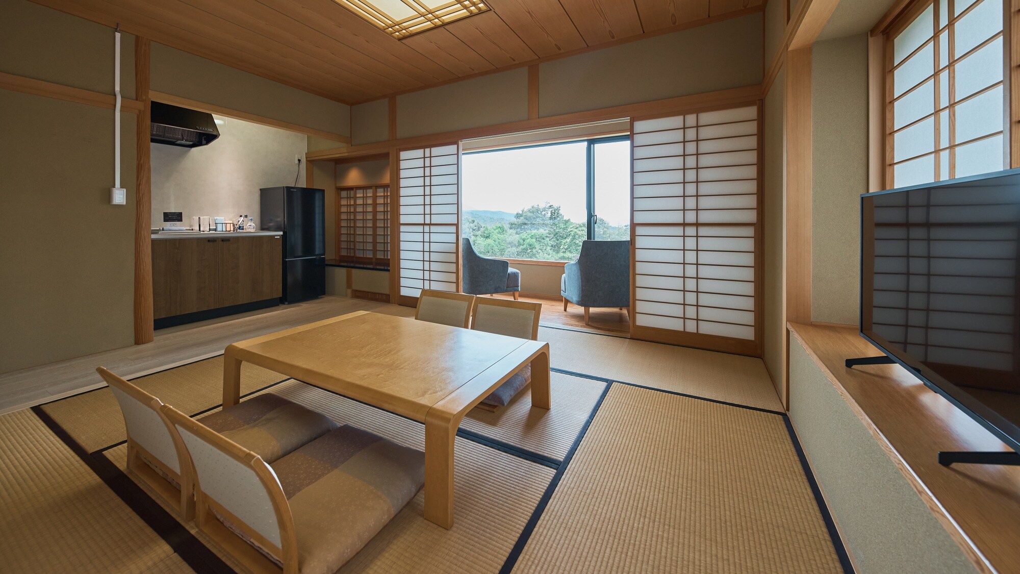 Deluxe Room 1 Example | There is a spacious kitchen.