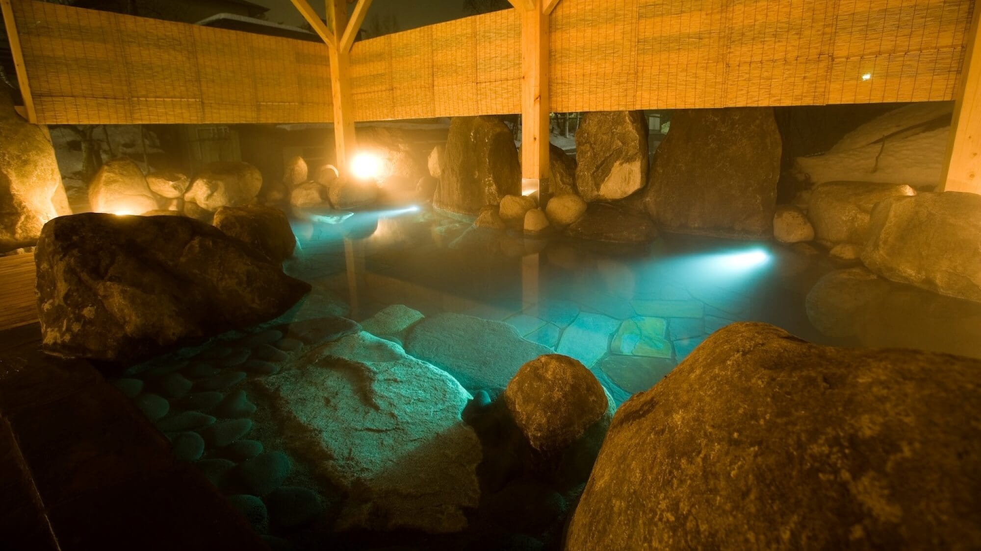 The large open-air bath is a 100% natural hot spring with water directly from the source.
