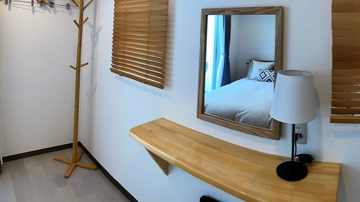 Guest room: Building C / Unified interior design creates a comfortable stay <Example>