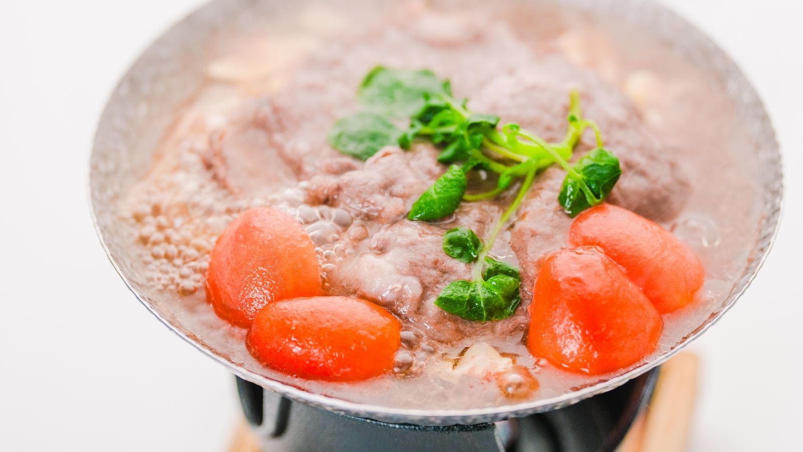 Shimane Wagyu beef in a small Japanese-style tomato hotpot