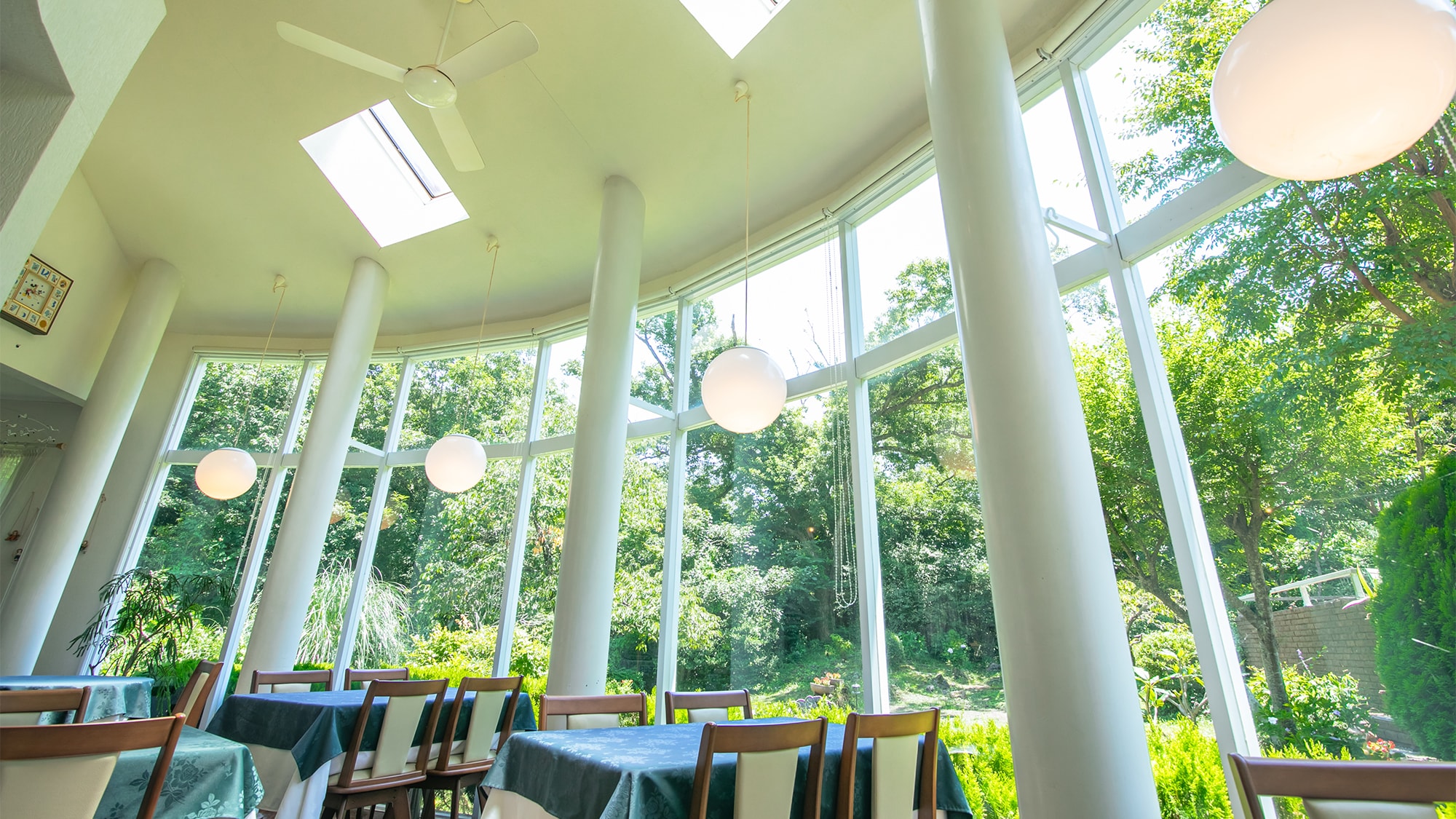*[Restaurant] Enjoy your meal in a bright and open space with tall glass windows.