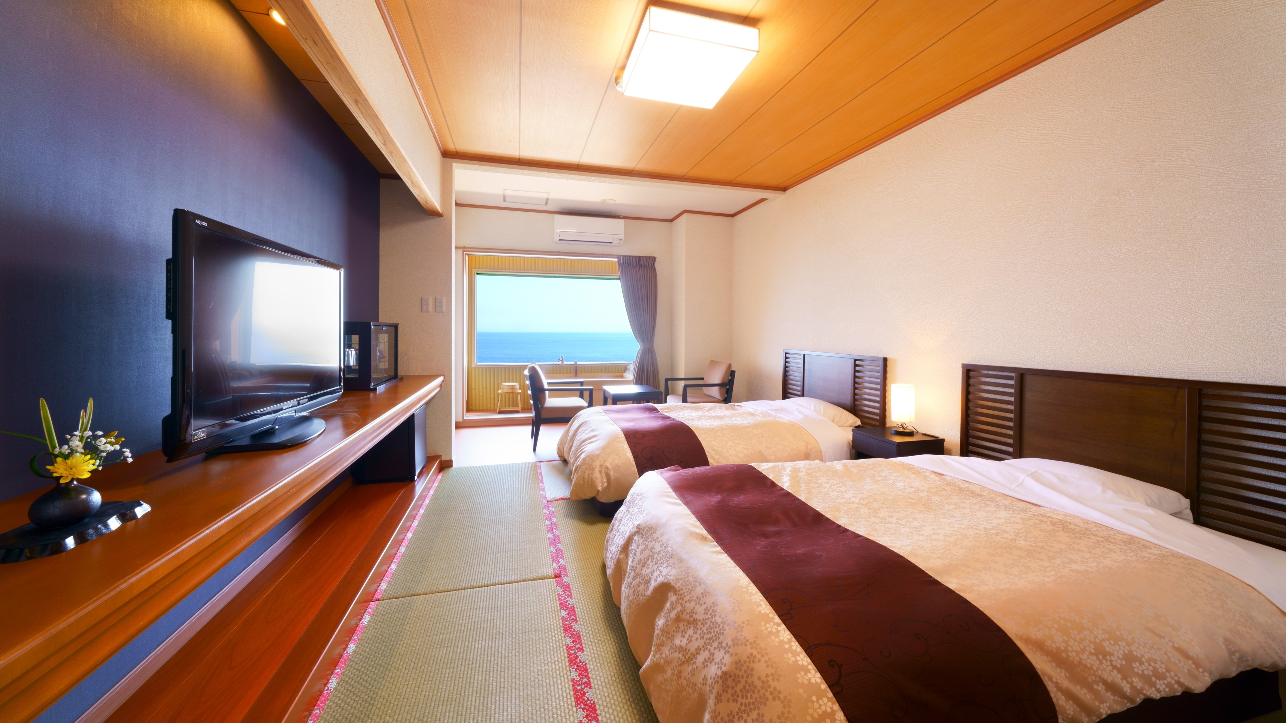 [Room with semi-open air] Japanese and Western room with sea view <twin / semi-double bed>