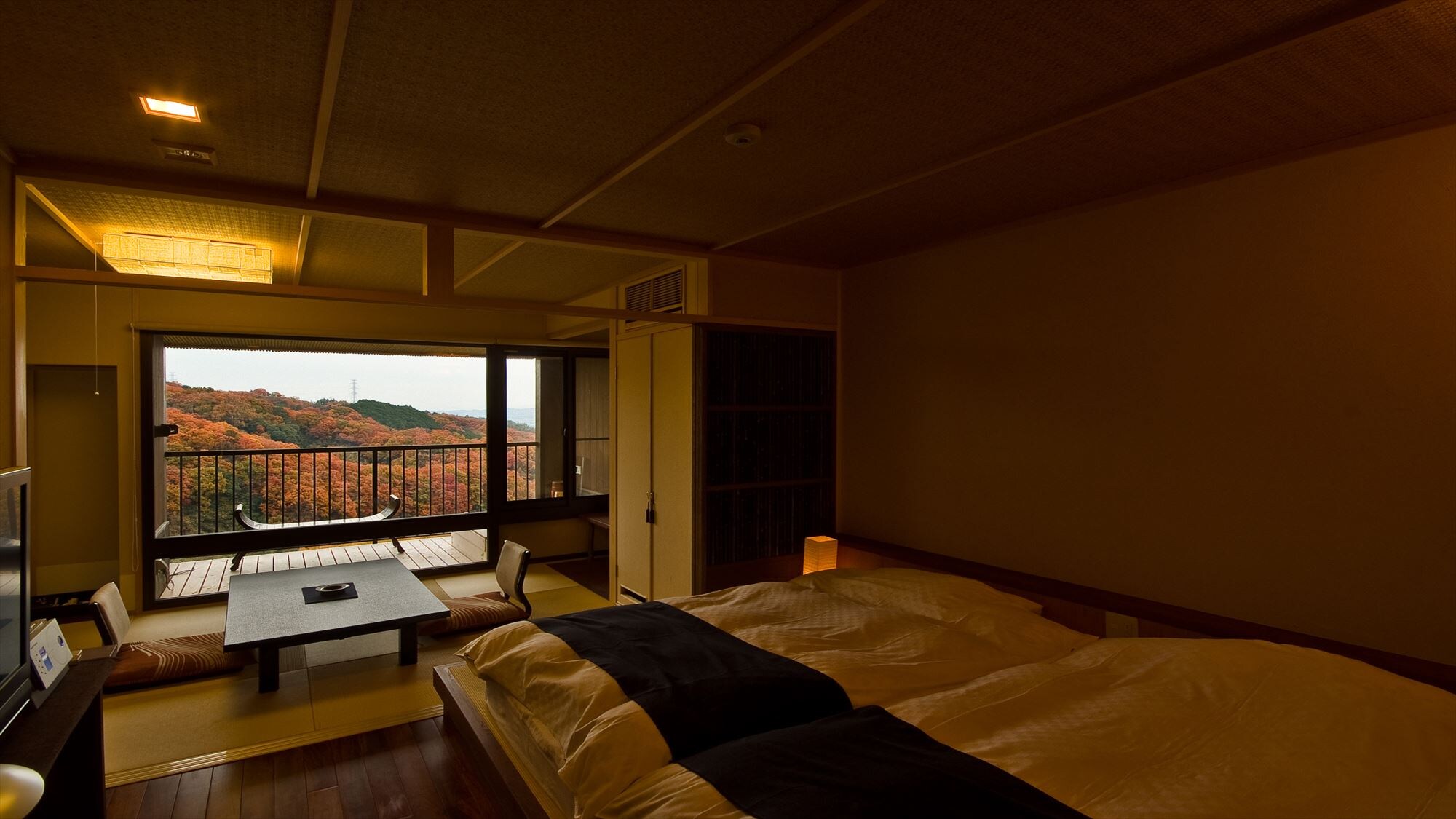 Junior suite room with open-air bath in autumn leaves season