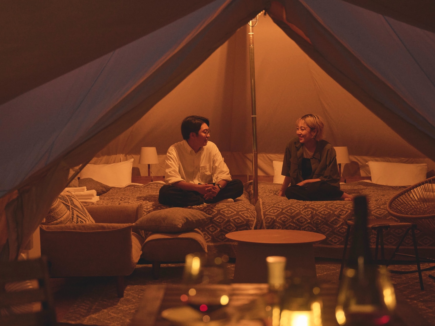 Glamping tent interior with 4 single beds