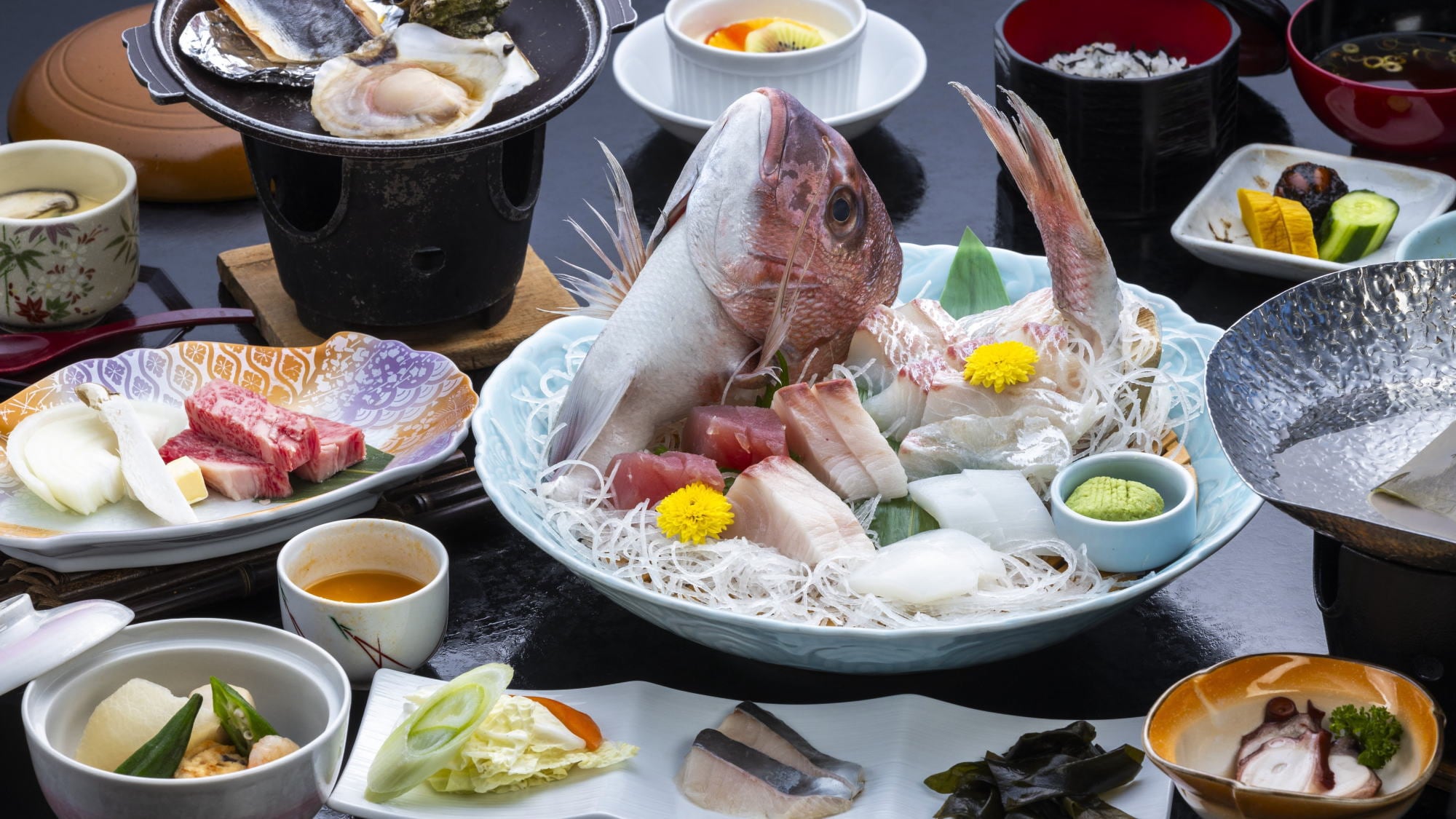 A seafood banquet featuring fresh, seasonal delicacies from Ishikagami throughout the year <Menu example>