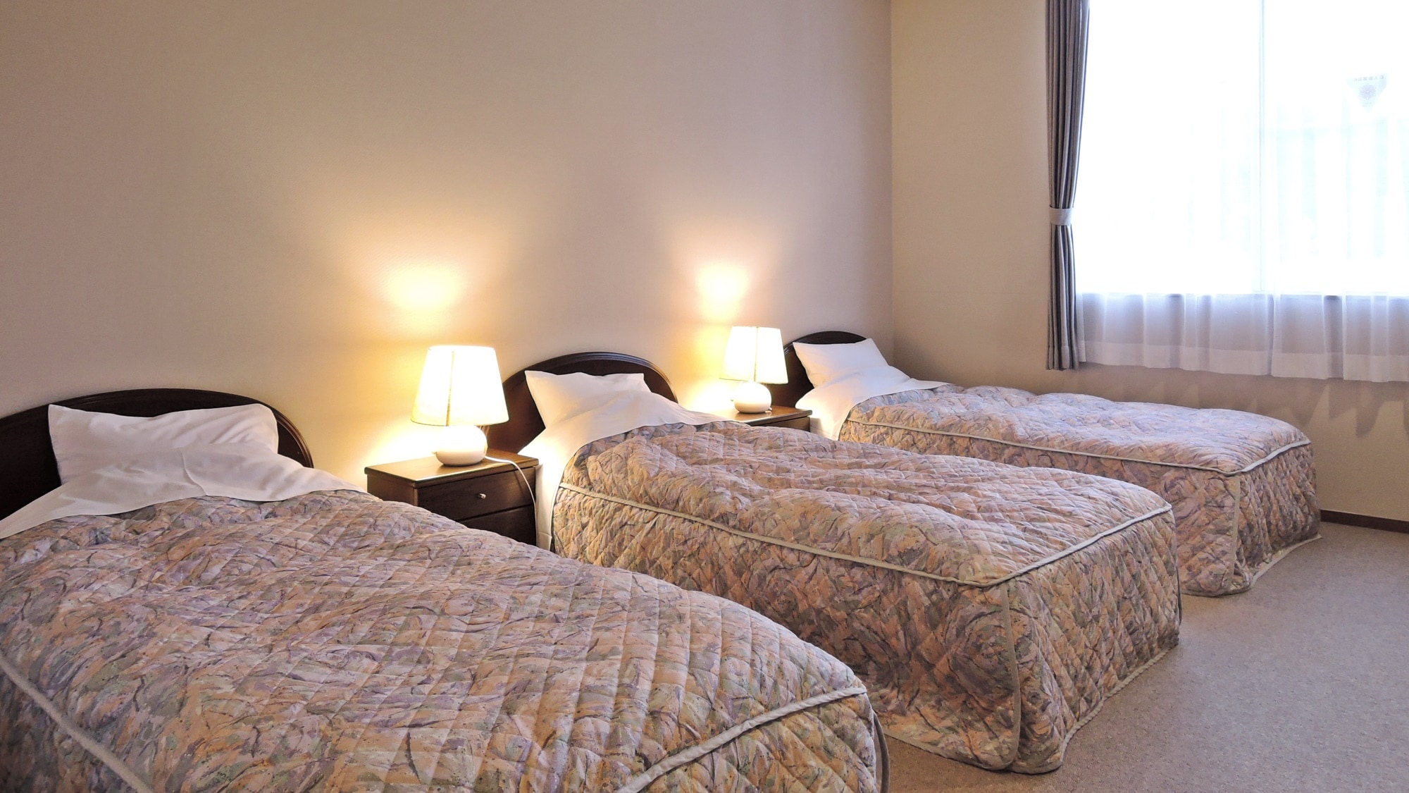 *[Room] This is an example of a triple room. Recommended for those who prefer beds. Includes a toilet.
