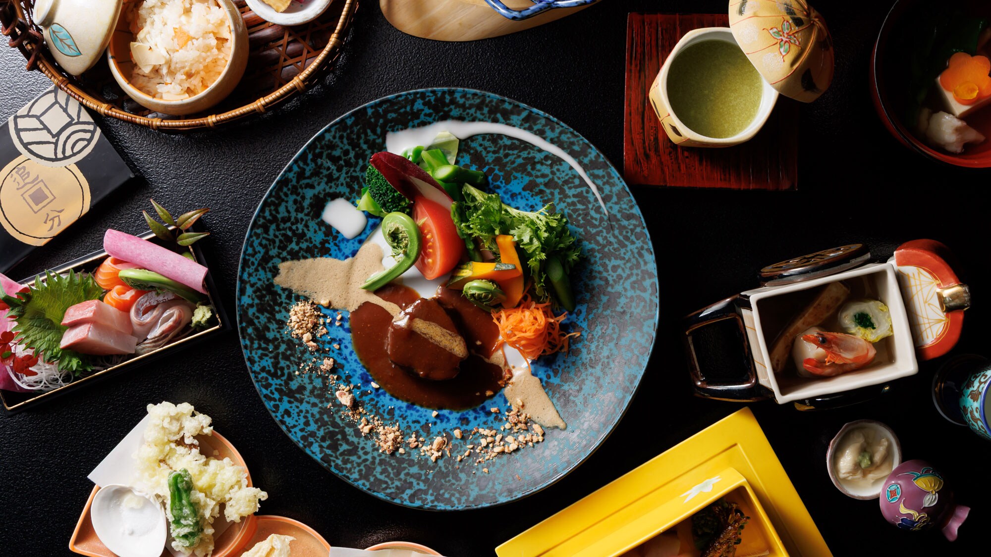 Dinner example: Colorful and seasonal. Enjoy the unique flavors of Oiwakeya Ryokan.