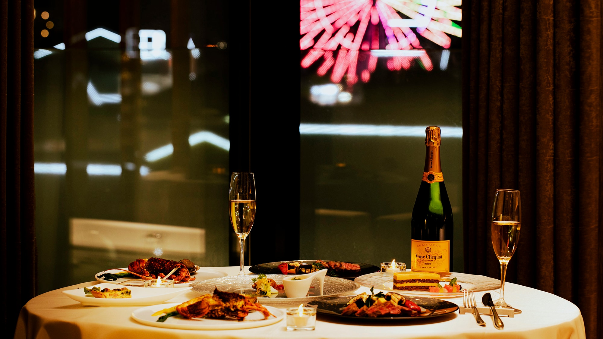 An in-room dinner where you can enjoy gourmet food with the night view of Hakata.