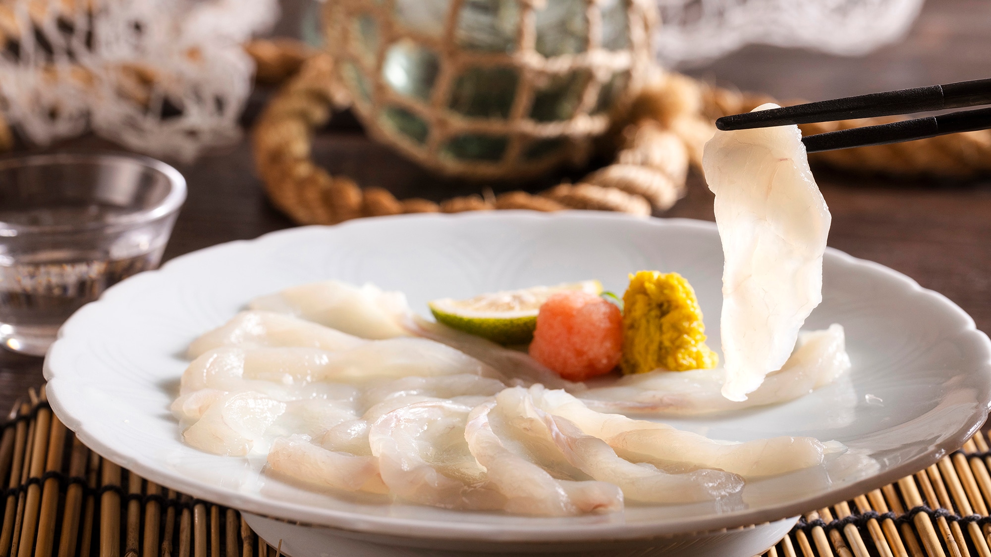 Freshly caught pufferfish carefully cooked! The translucent flesh is chewy and full of flavor.