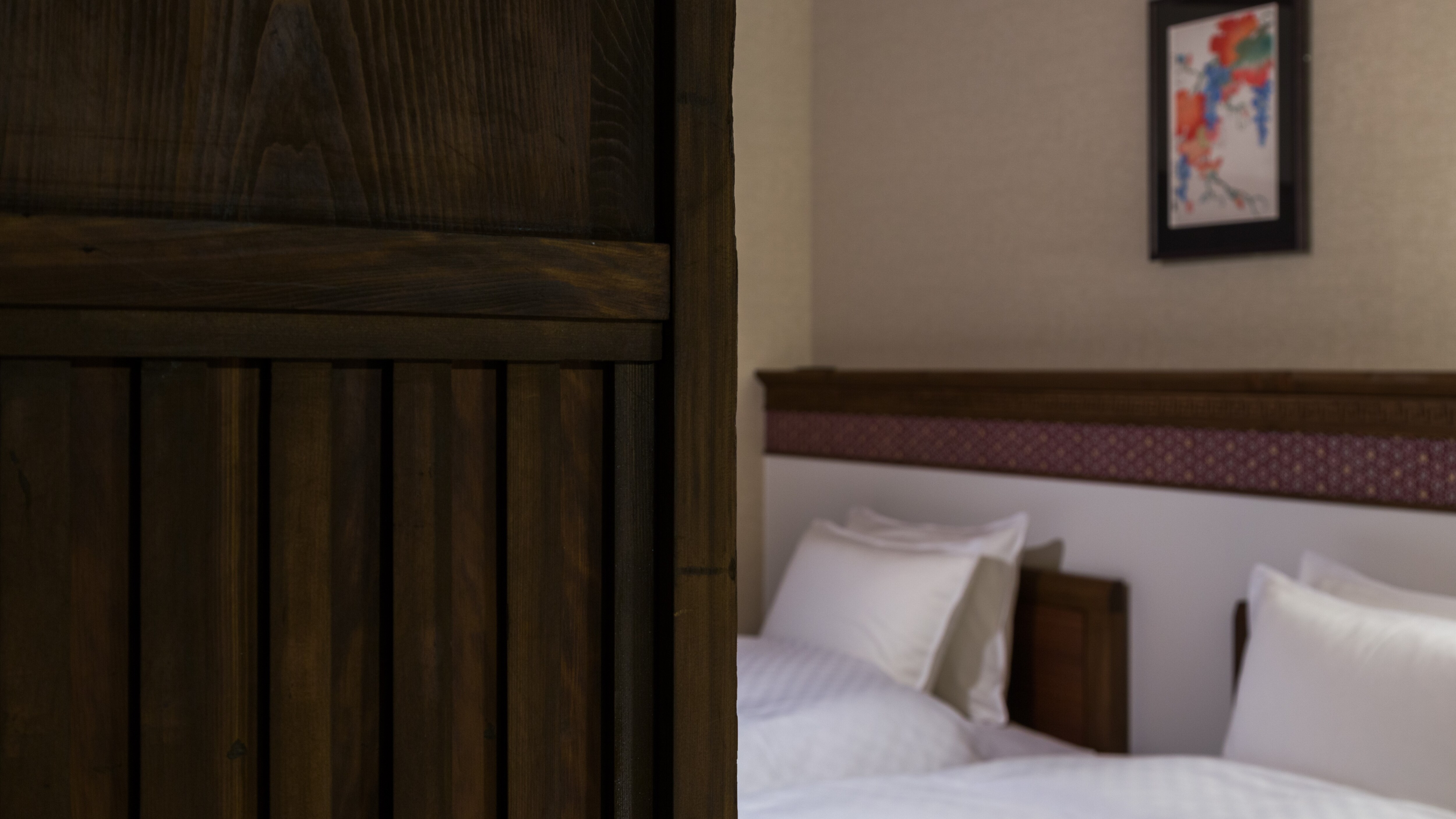 Sliding door to 2nd floor bedroom: The antique door has a lattice that can be opened or closed.