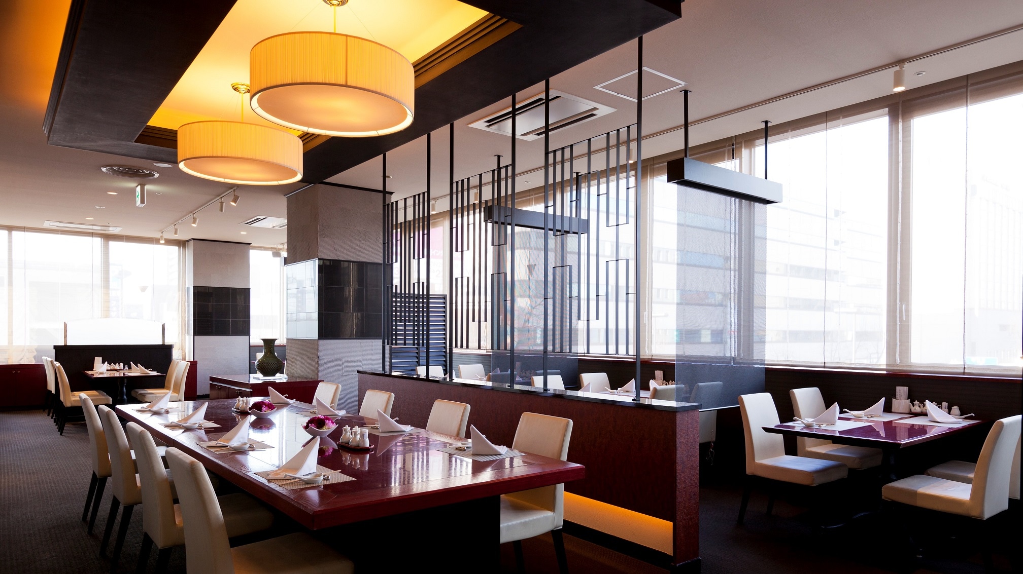 A stylish space with a red and black theme. Great for both large and small groups.