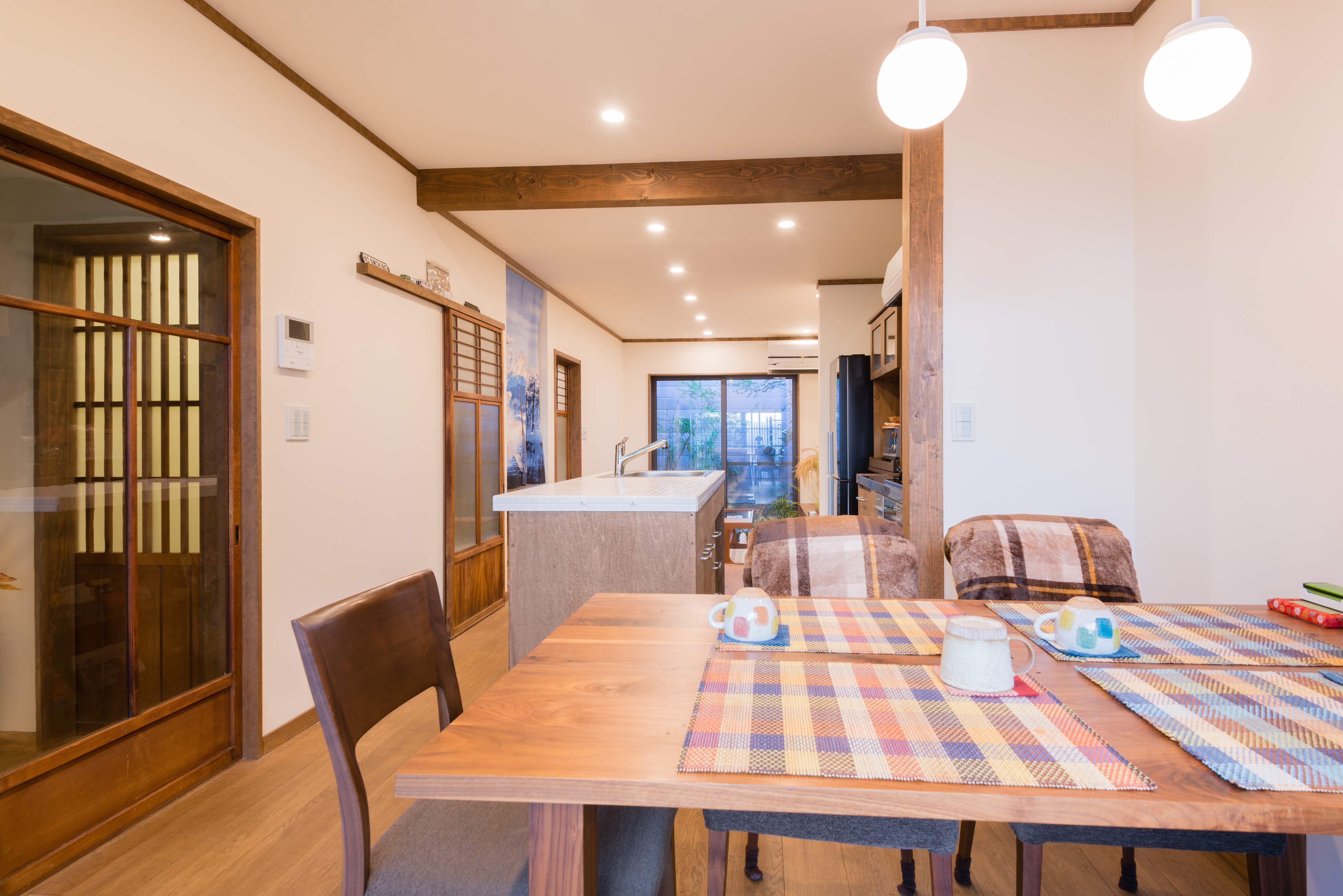 Full view of the living space on the first floor as seen from the dining area
