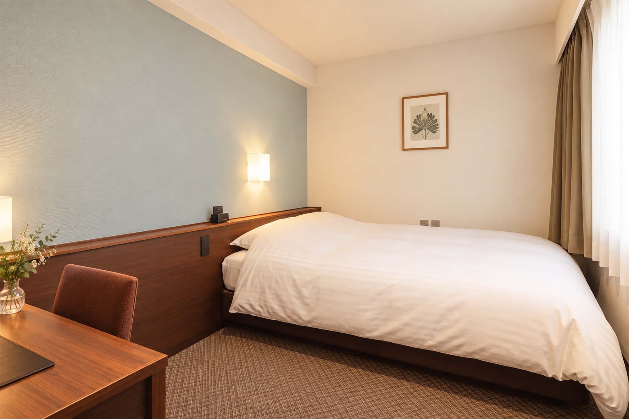 Semi-double room (13 sq m, bed width 140 cm)