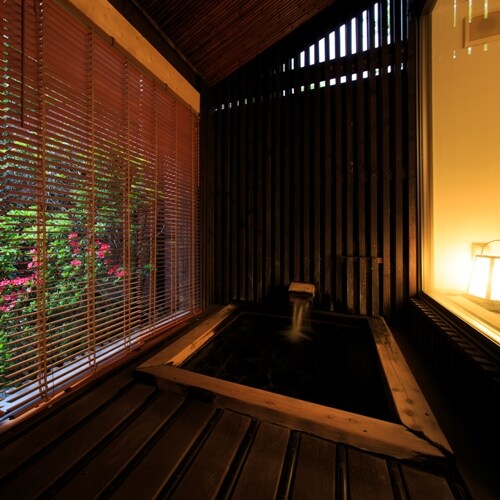 Modern Japanese and Western room with open-air bath