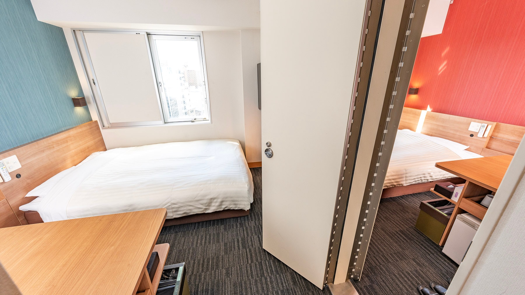 This room has two rooms with a door between them.