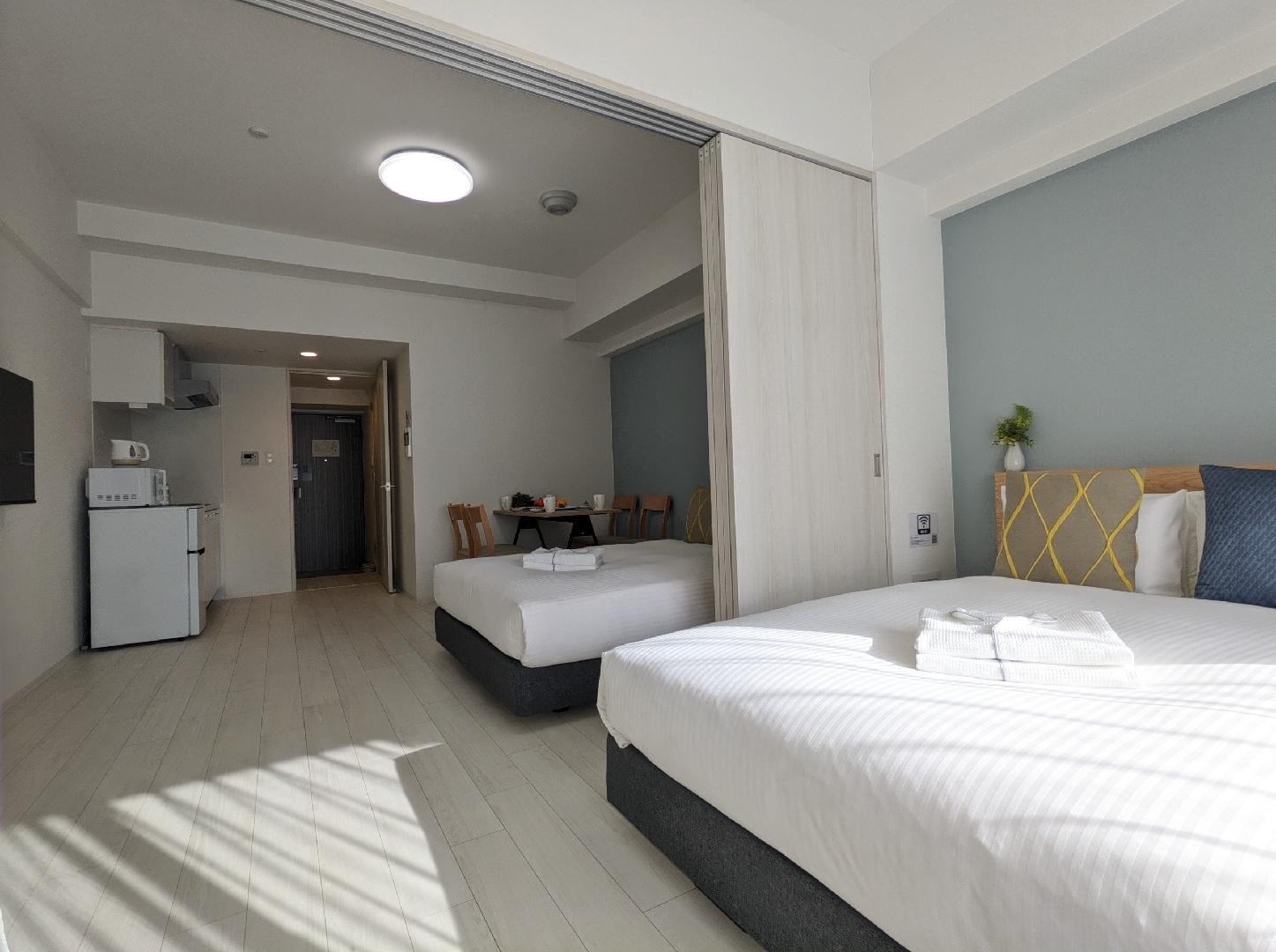 2 double beds with partition
