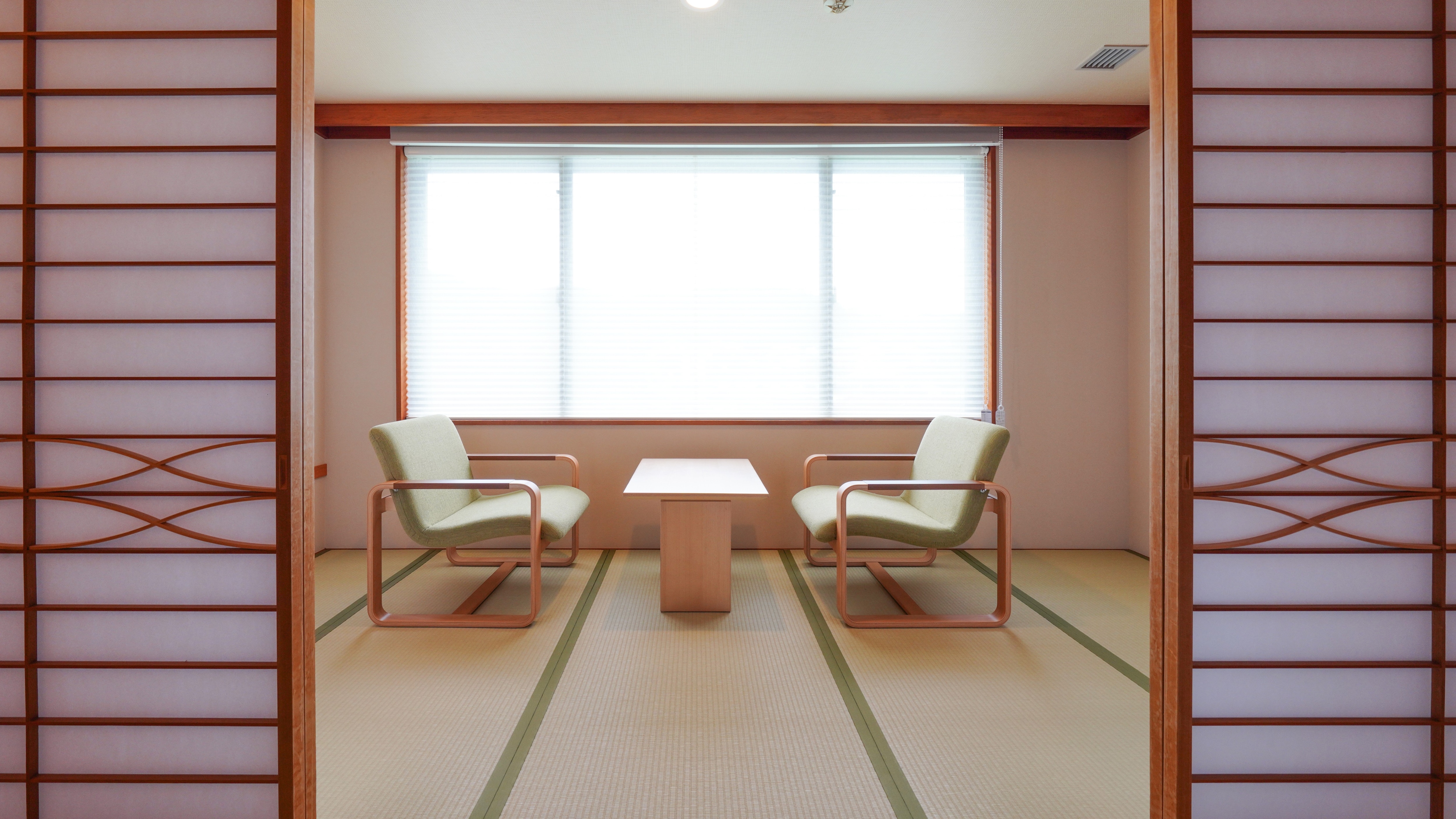 Wide veranda: Handmade chairs by Tendo Mokko