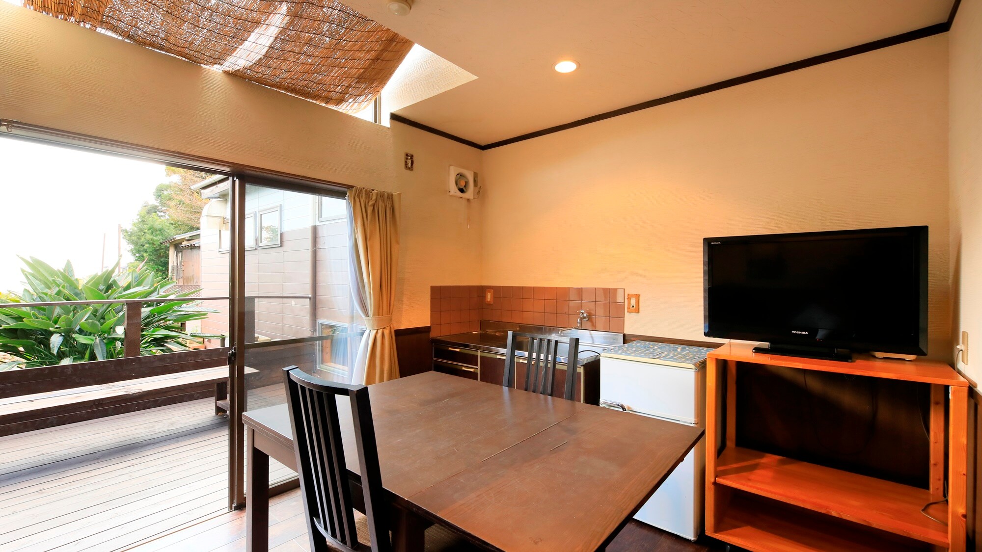 Twin room with massage chair | The door to the room is 70cm wide and is flat all the way to the wooden deck.