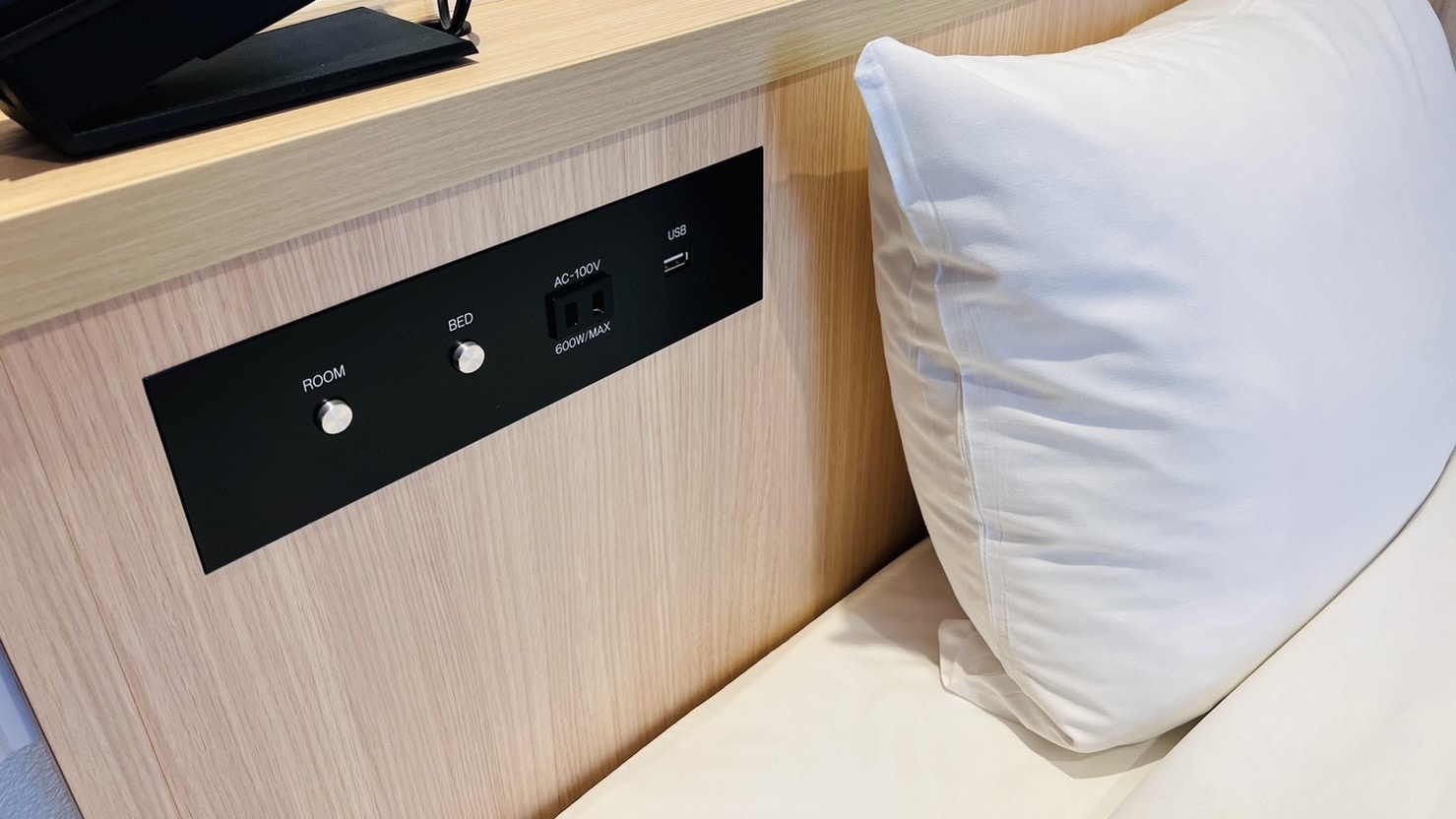 Single bedside power outlet