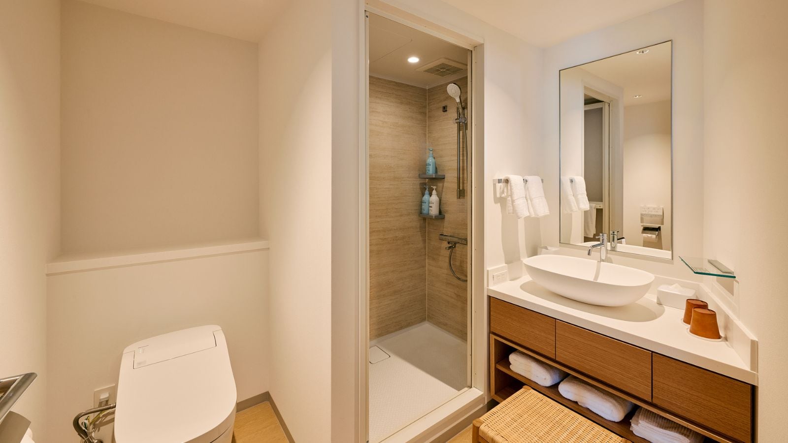 Standard twin room | Spacious shower booth (no bathtub), toilet with washing function, and sink