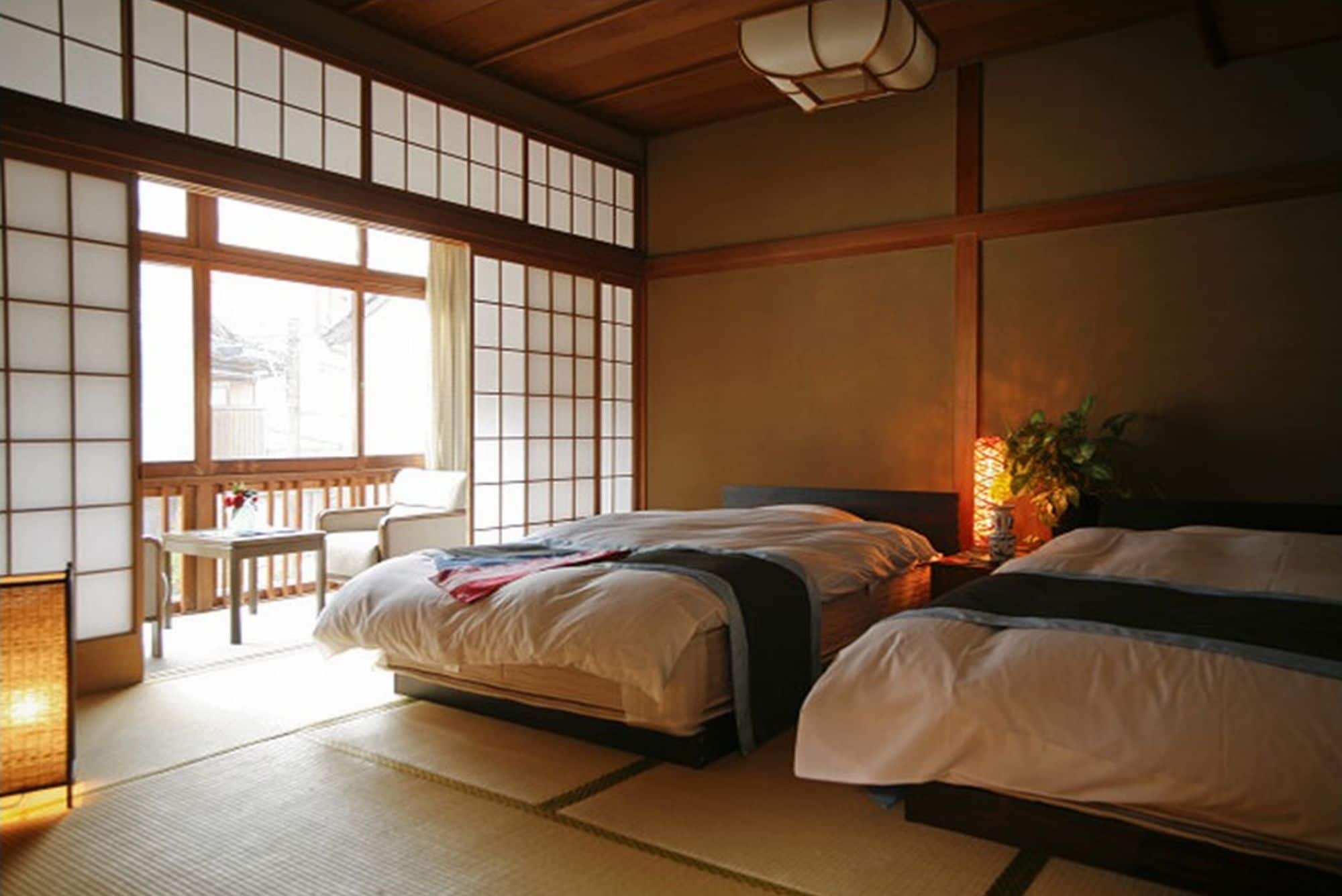 Simmons' twin Japanese-style bedroom. It has a low bed on tatami mats.