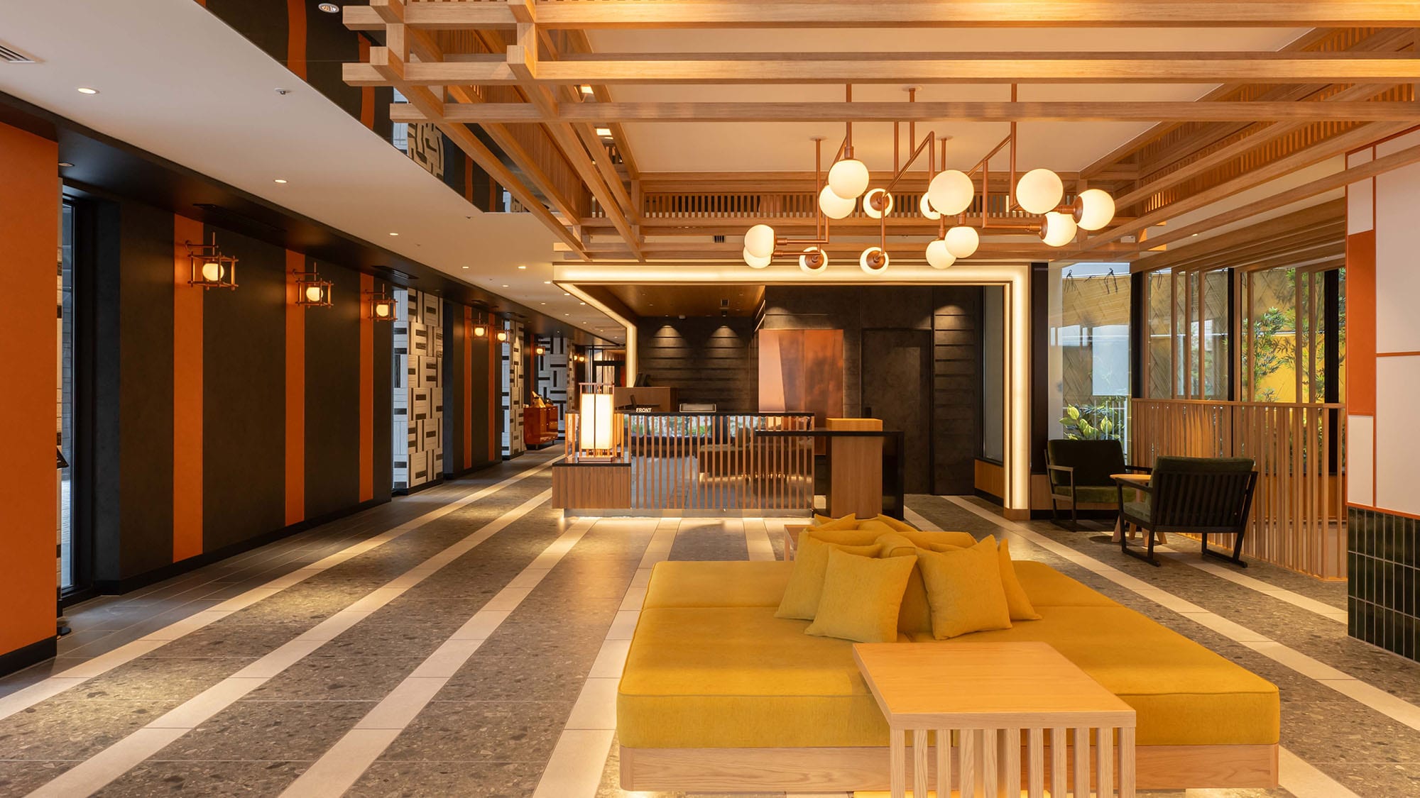 You will be welcomed in a spacious lobby with a modern Japanese interior.