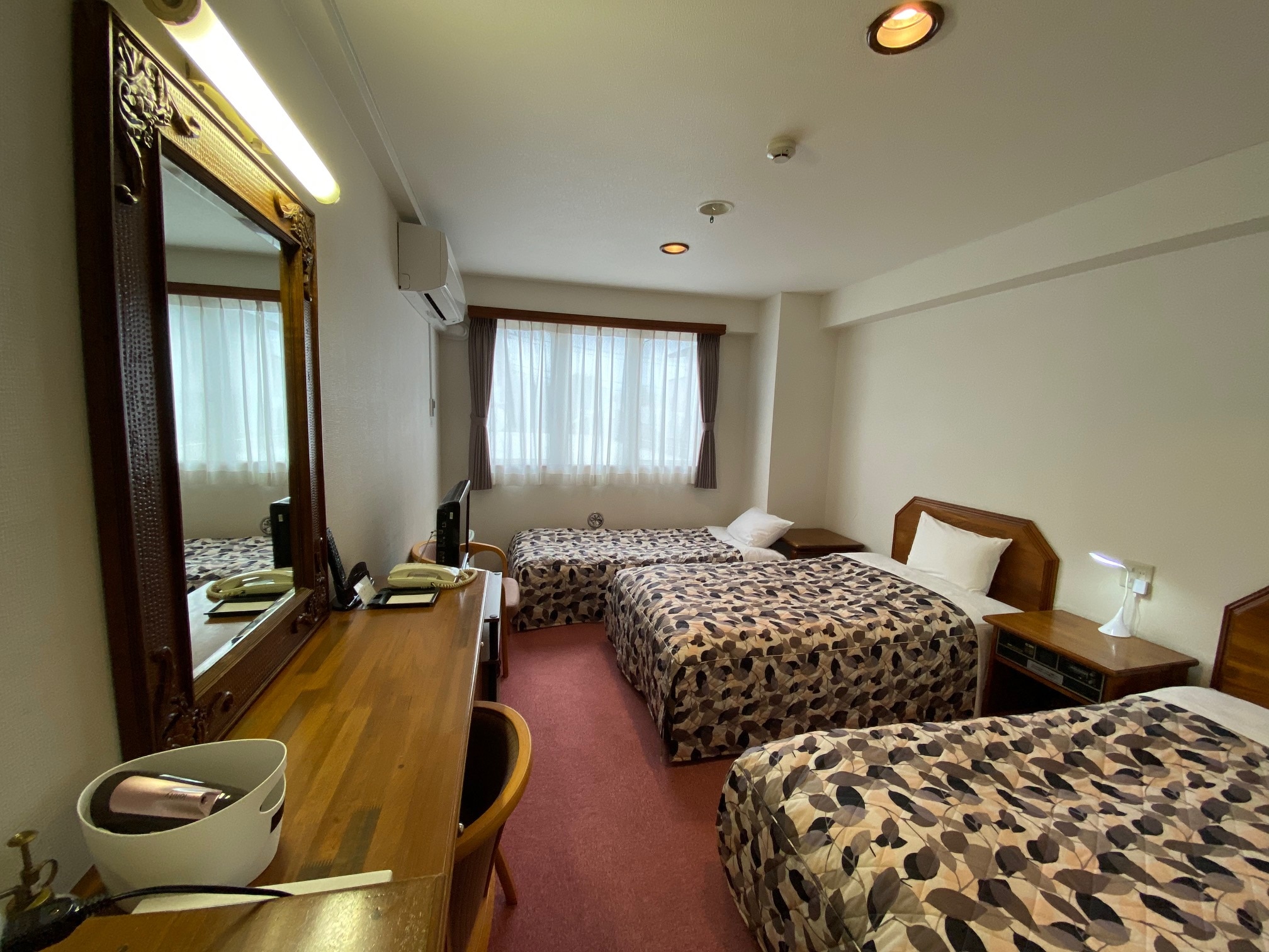 Triple room (24 sqm) Wide single bed (110 cm wide) 2 extras (90 cm wide) 1