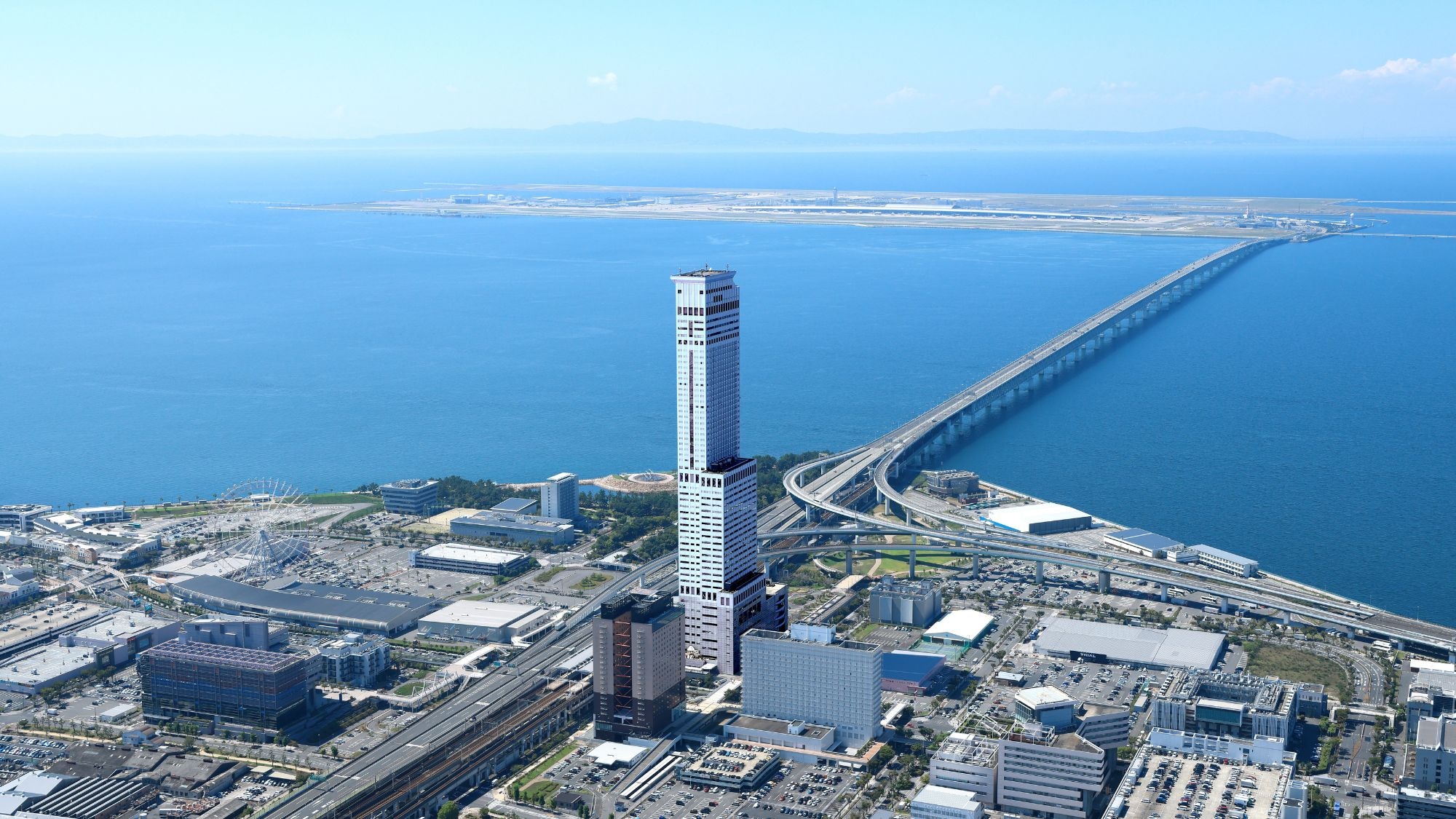 One station away from Kansai Airport, directly connected to JR Nankai Rinku Town Station.