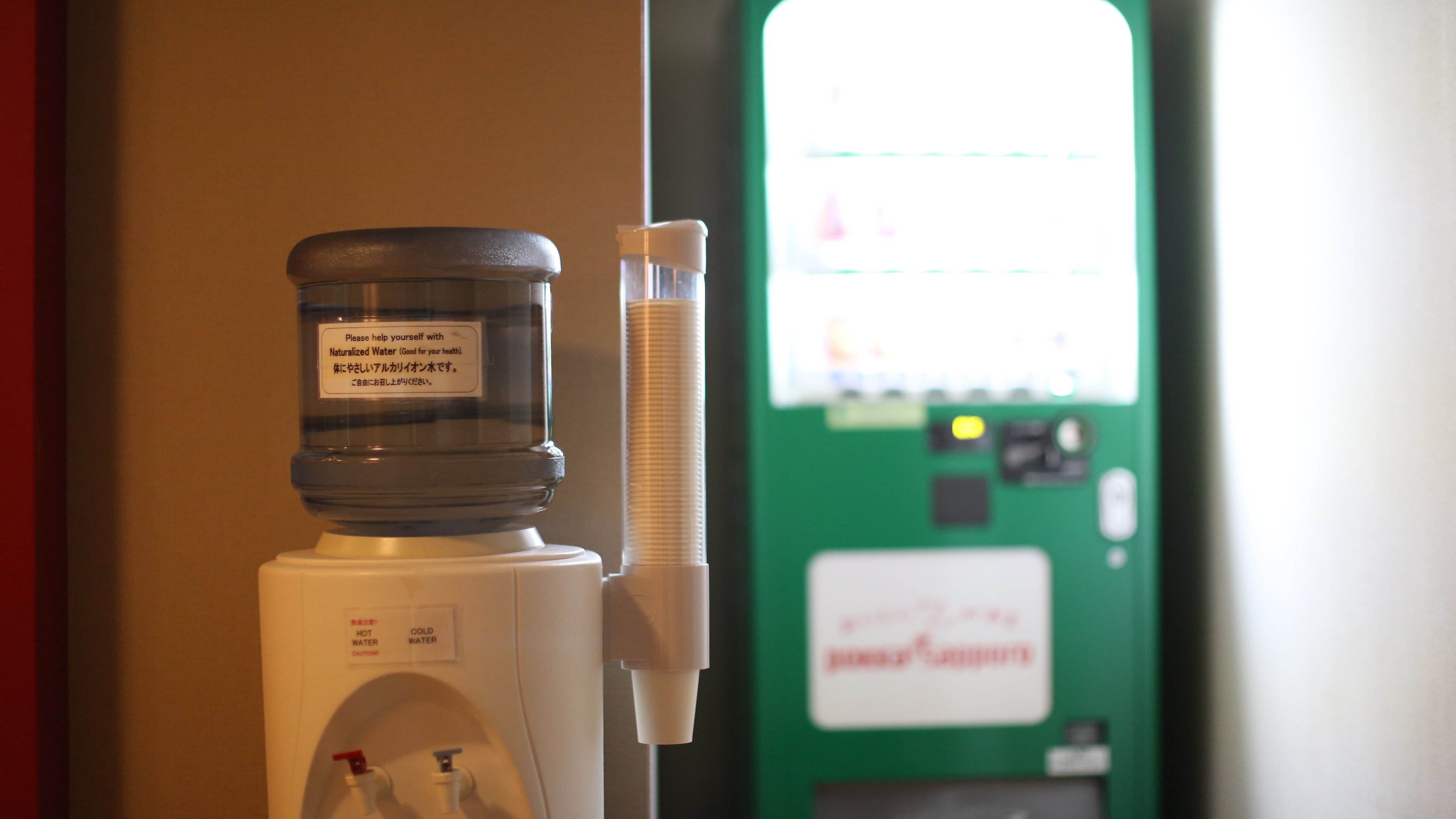 Vending machines and water dispensers are installed in the corridors on each floor.