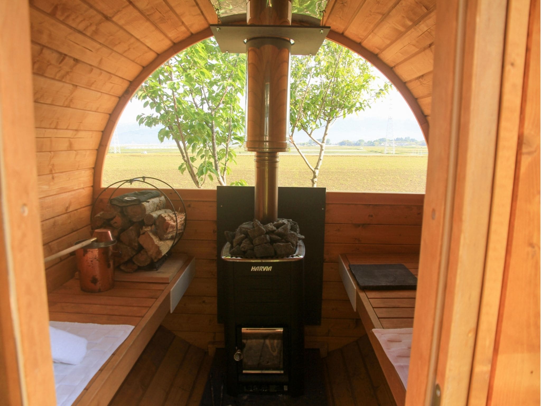 Wood-burning stove style barrel sauna