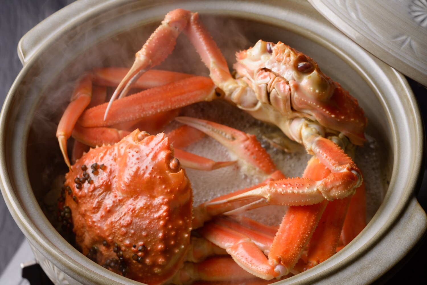Steamed Matsuba crab in a clay pot