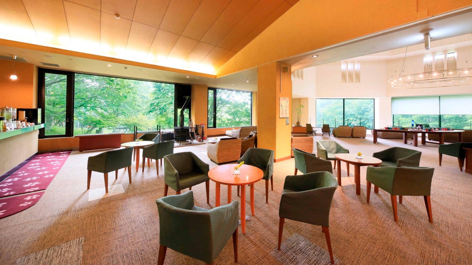 Lounge | There is a fireplace, book space, and free drink space in one space