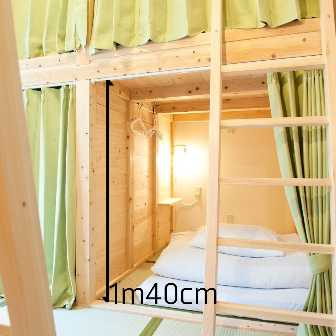 The bed space is separated vertically and horizontally, giving it a private feel.