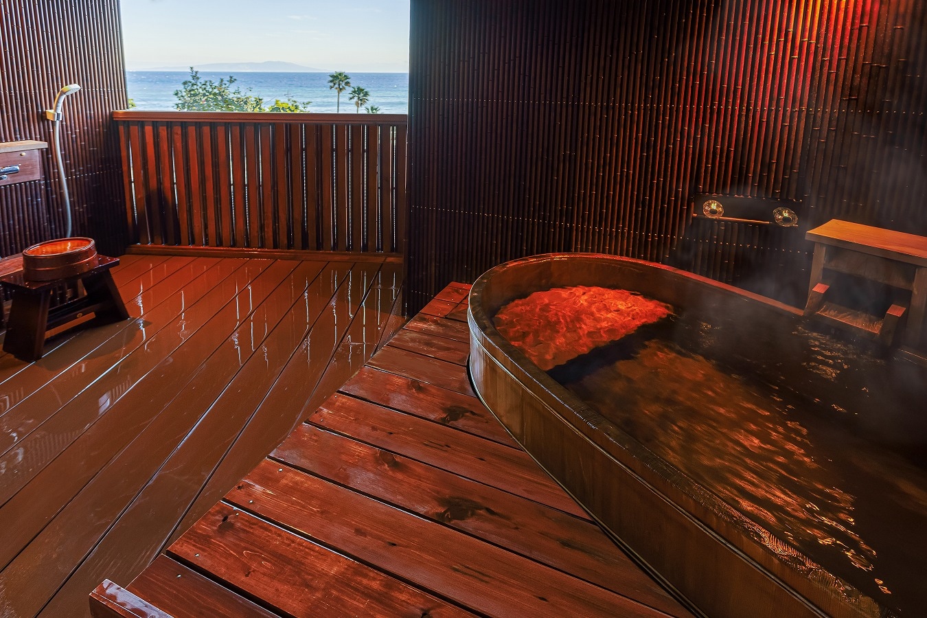 Renren, a guest room with an open-air hot spring bath overlooking the sea