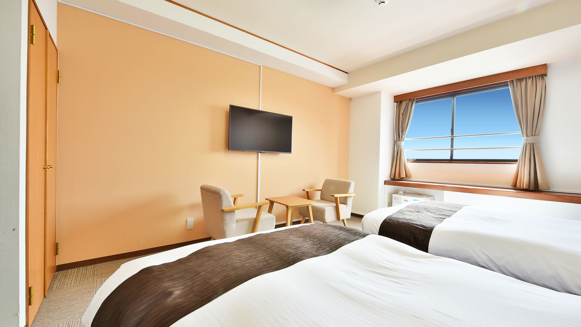 นี่คือตัวอย่างห้องเตียงคู่ระดับเลื่อนขึ้น