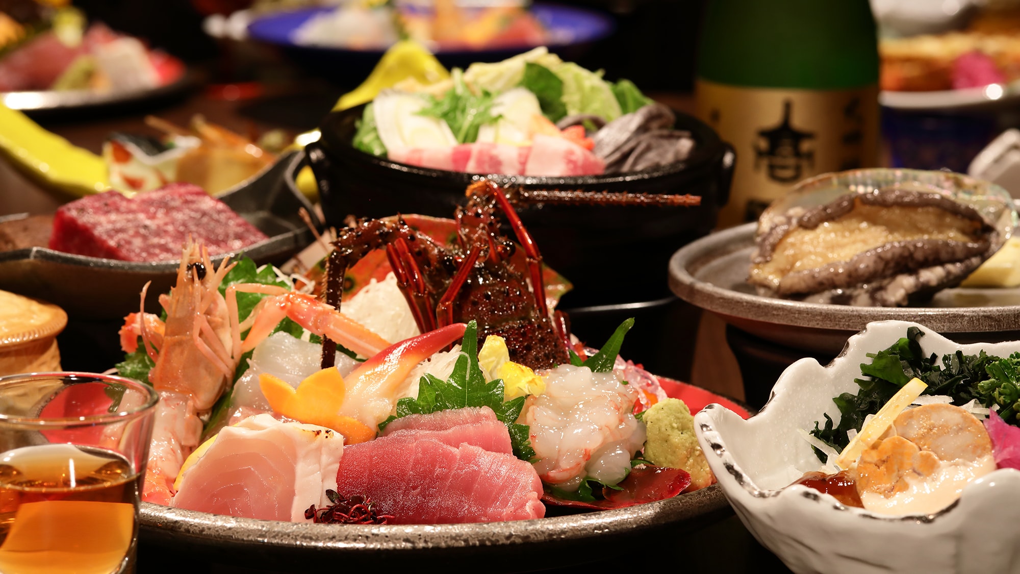 "Fuji no Hana Kaiseki" seasonal example with spiny lobster and abalone
