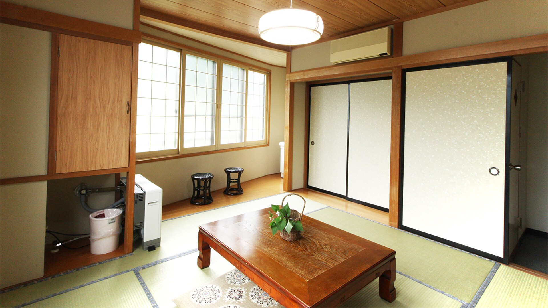 Japanese-style room (8 tatami mats) with toilet and washbasin