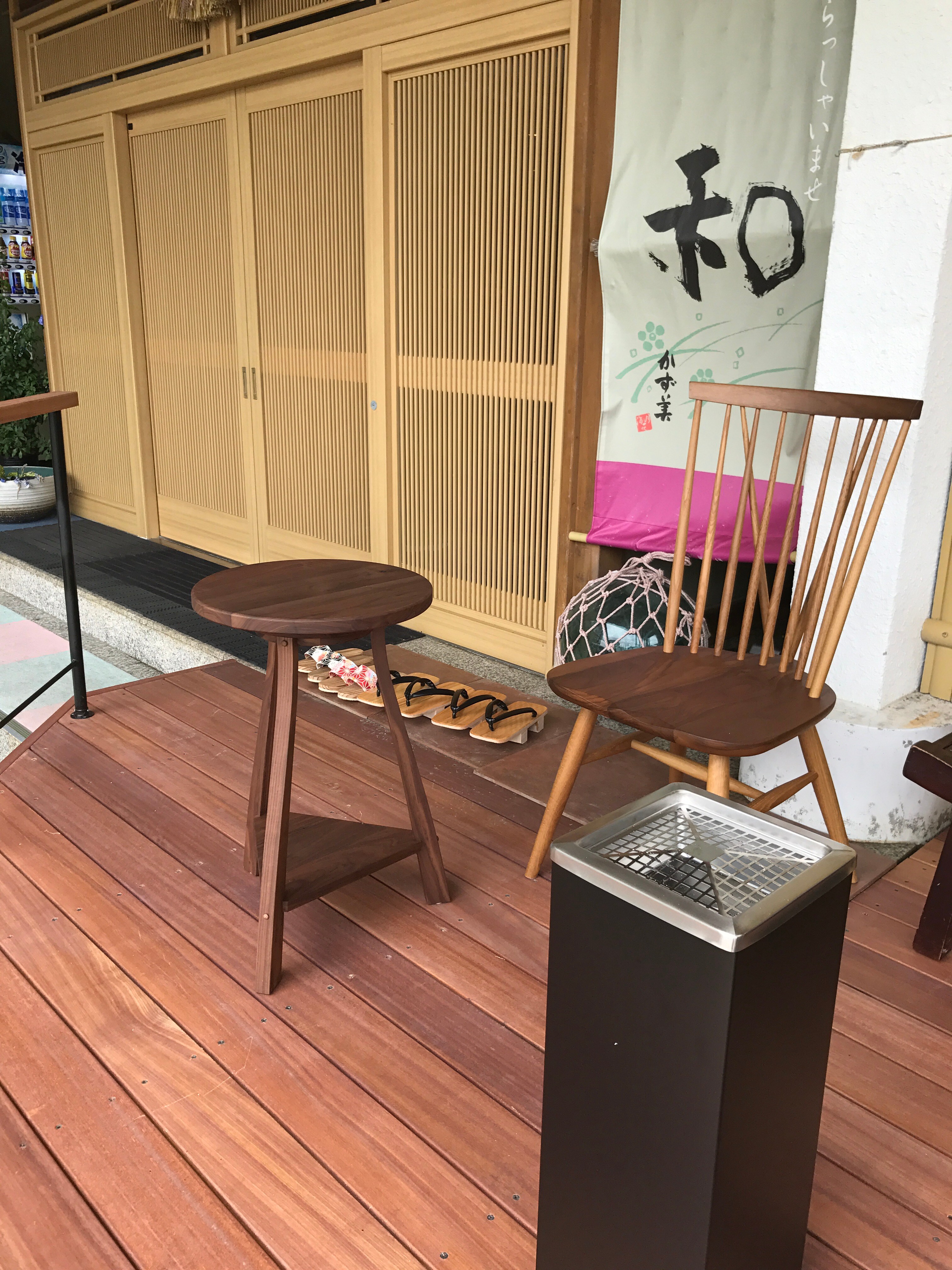 Wooden deck in front of the entrance