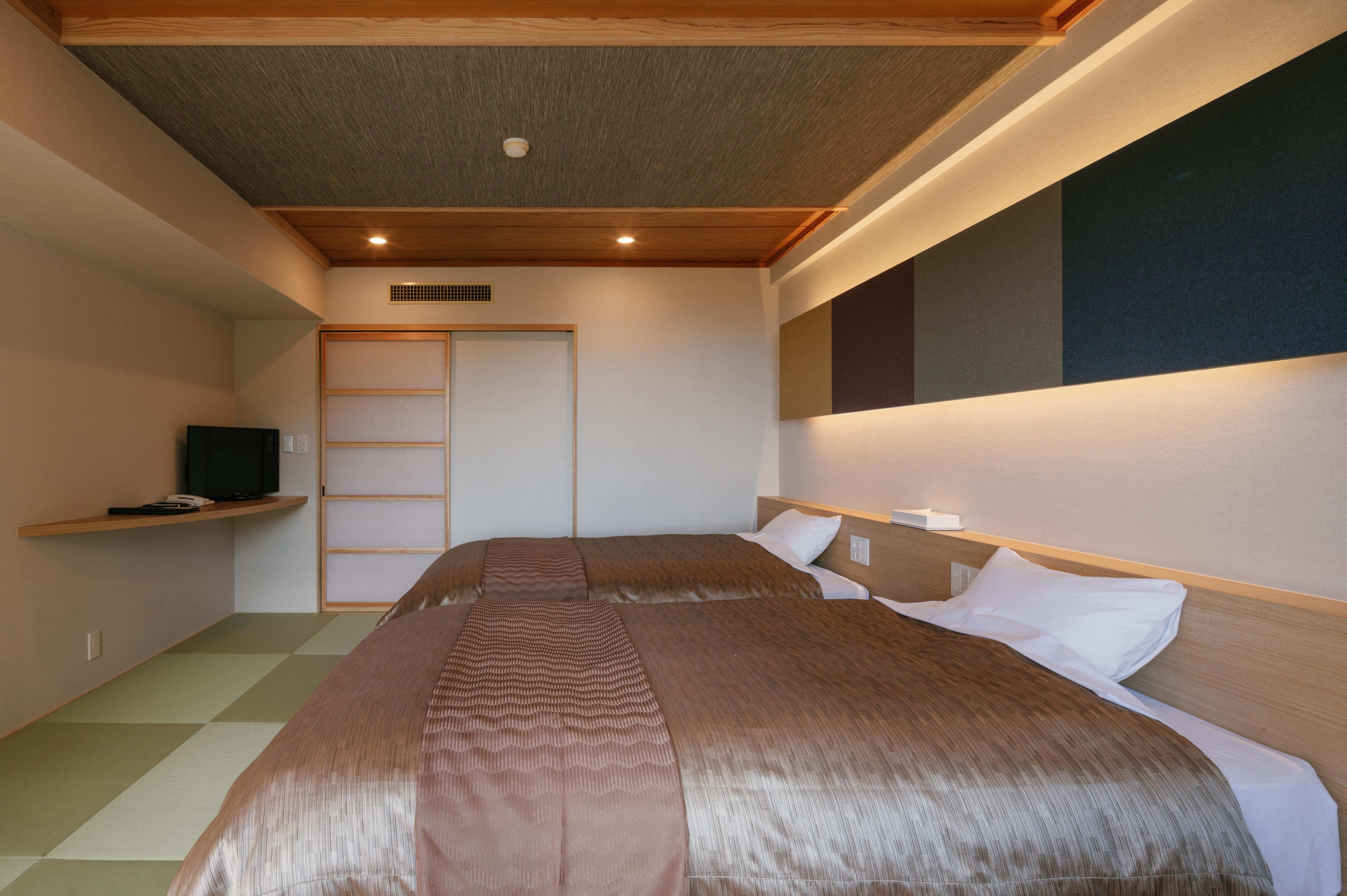 Contoh kamar kembar bergaya Jepang-modern di Sayap Timur.