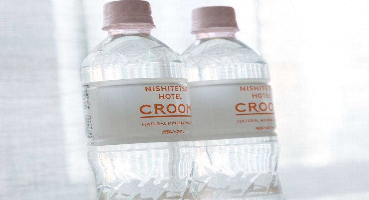 With mineral water (please after using the large communal bath)