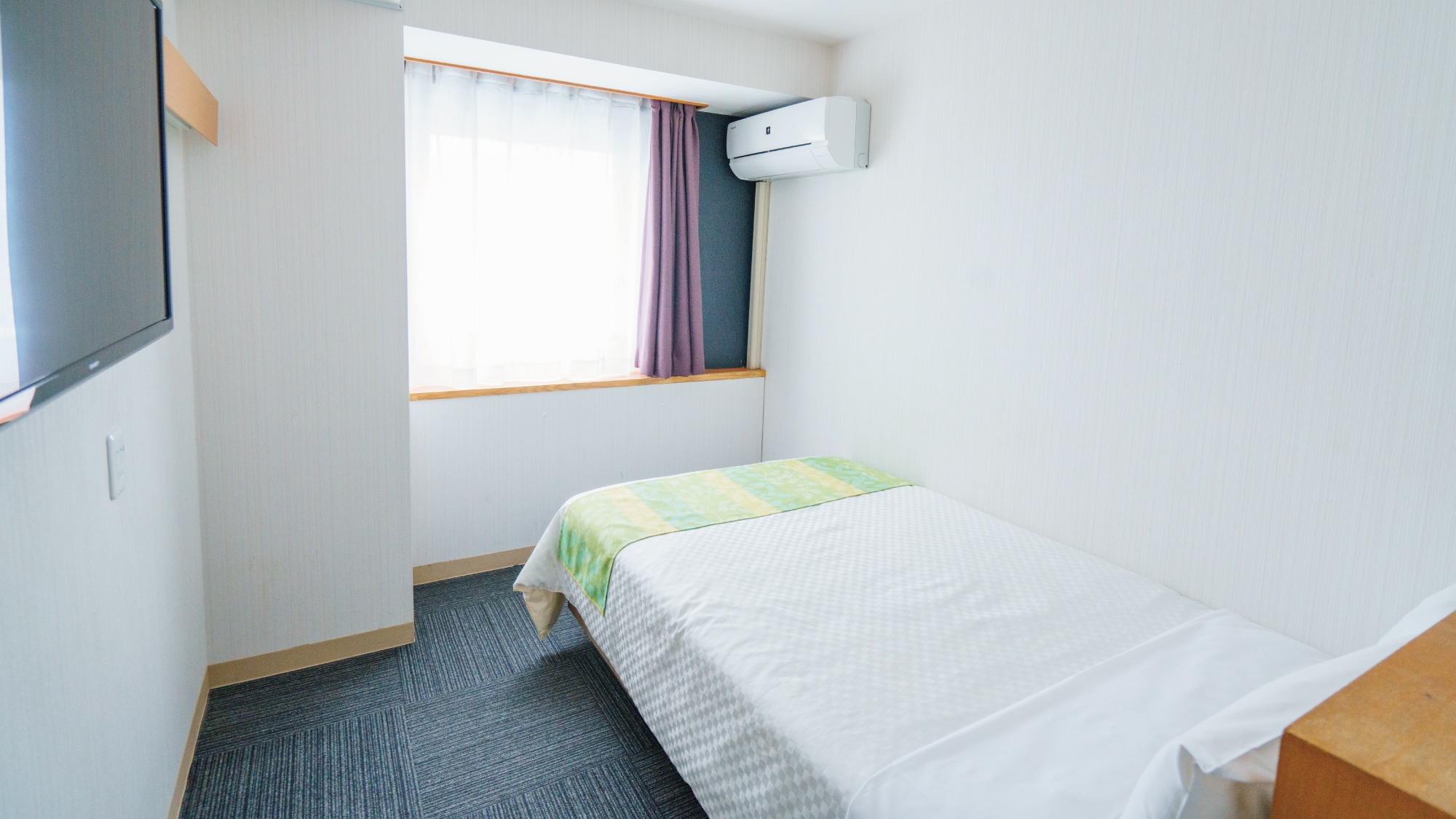 The semi-double room is a simple room and can accommodate up to 2 people sharing one bed.