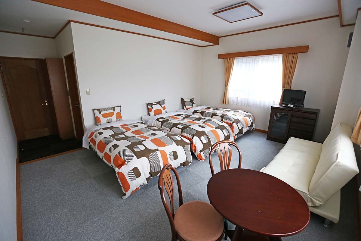 Western-style Room A (with bath/toilet) is a spacious room where you can relax.