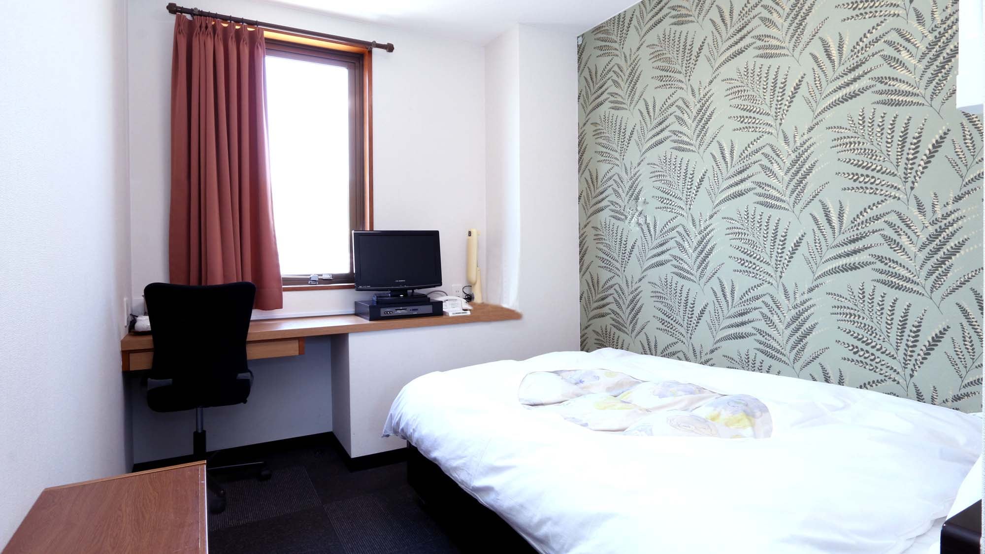 [Example of a single room] This is the most standard room in our hotel.