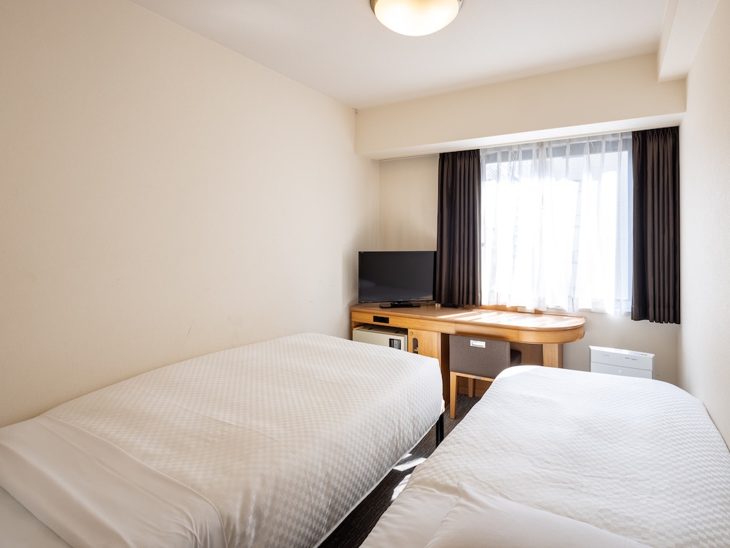 Casual twin room room size 15㎡, 2 single beds (110cm width & 90cm width)