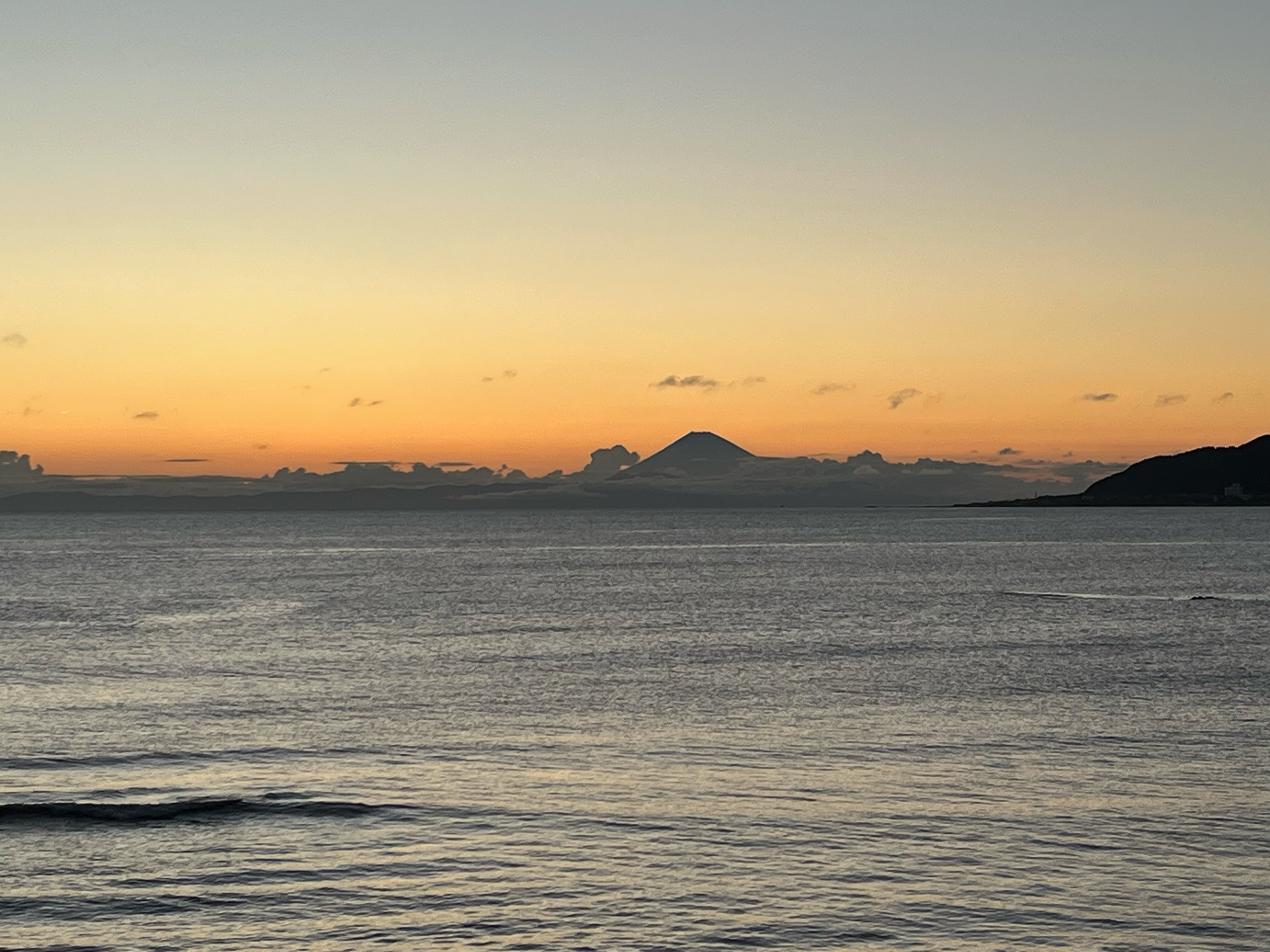 The sea at dusk spreads out before your eyes