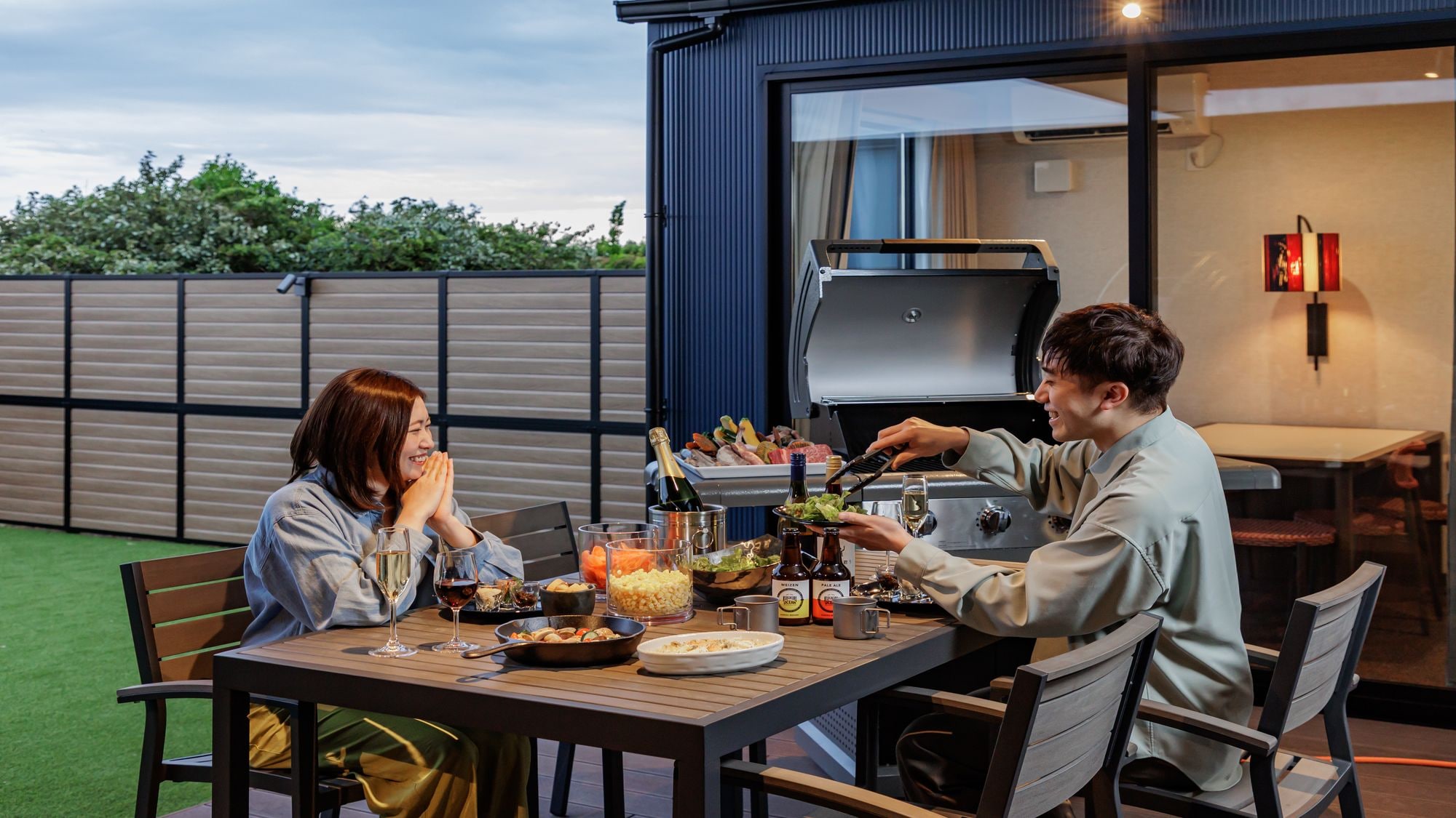 The terrace is equipped with a BBQ set.
