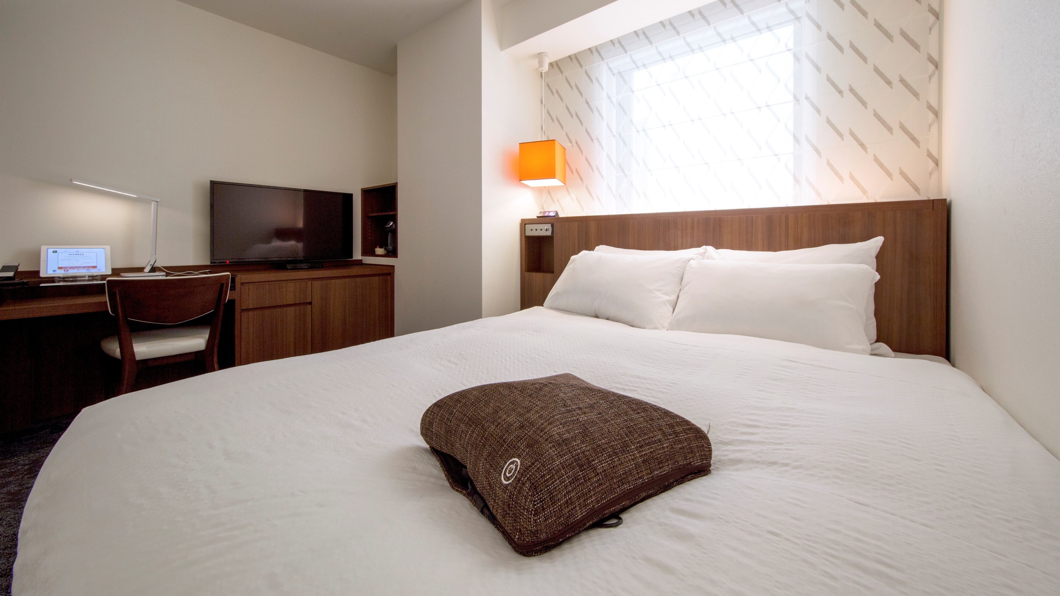 Room "Superior Double" that values the time spent at the hotel * The layout varies depending on the room.