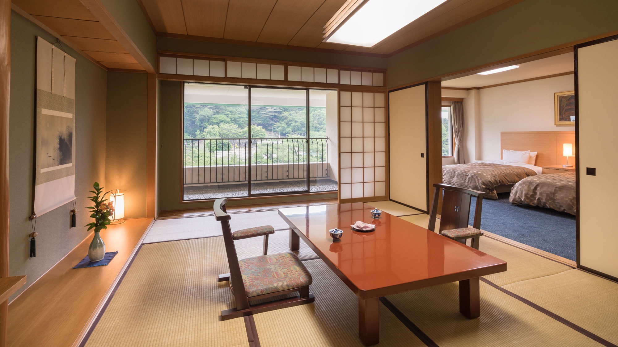 [Japanese-Western style room] 75.6 square meters / Japanese style room with 12 tatami mats and a 120cm semi-double bed / bath and toilet with washing machine