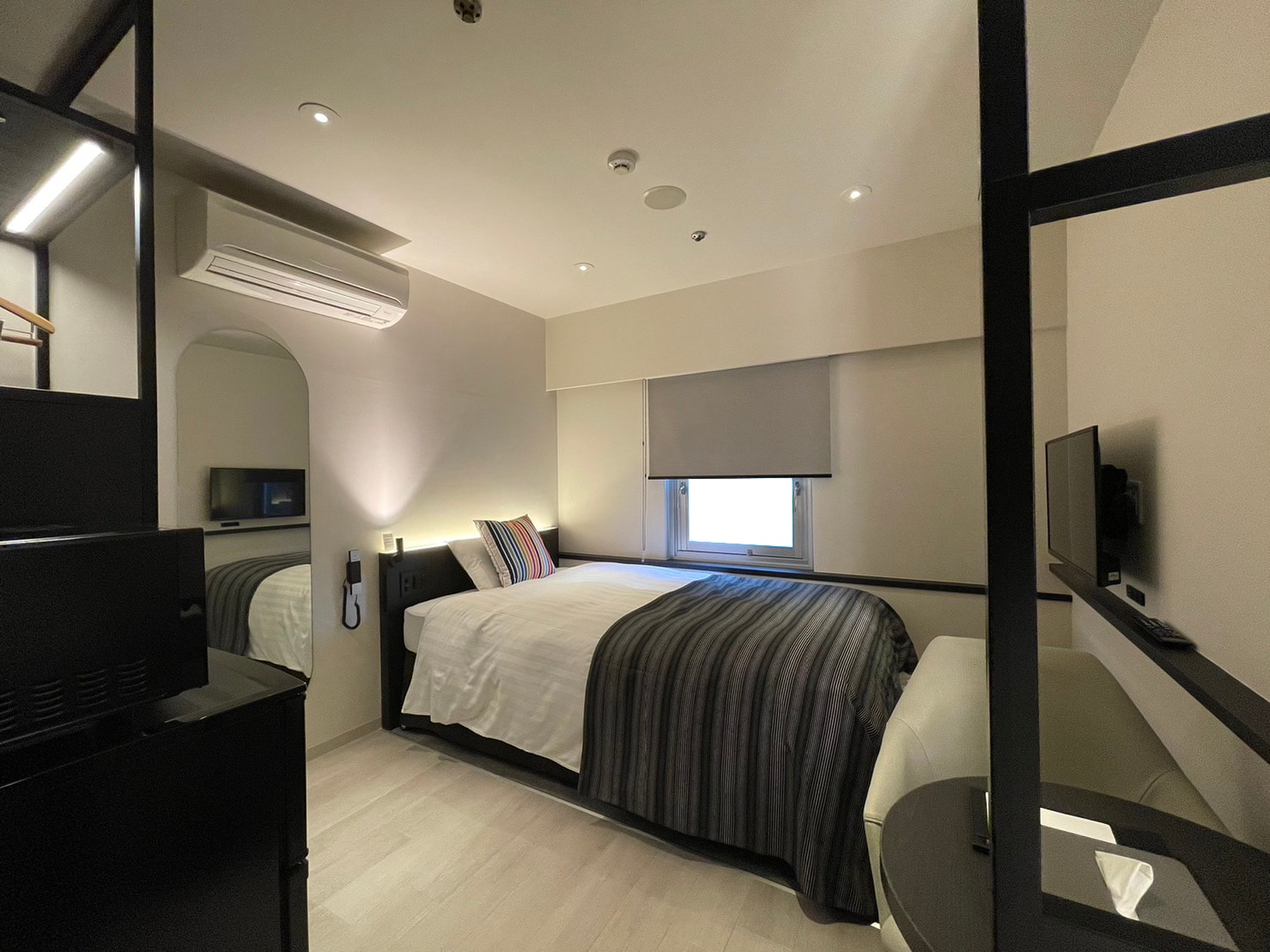 Designer's studio twin with kitchenette *There is no unit bath. Shower booth only.